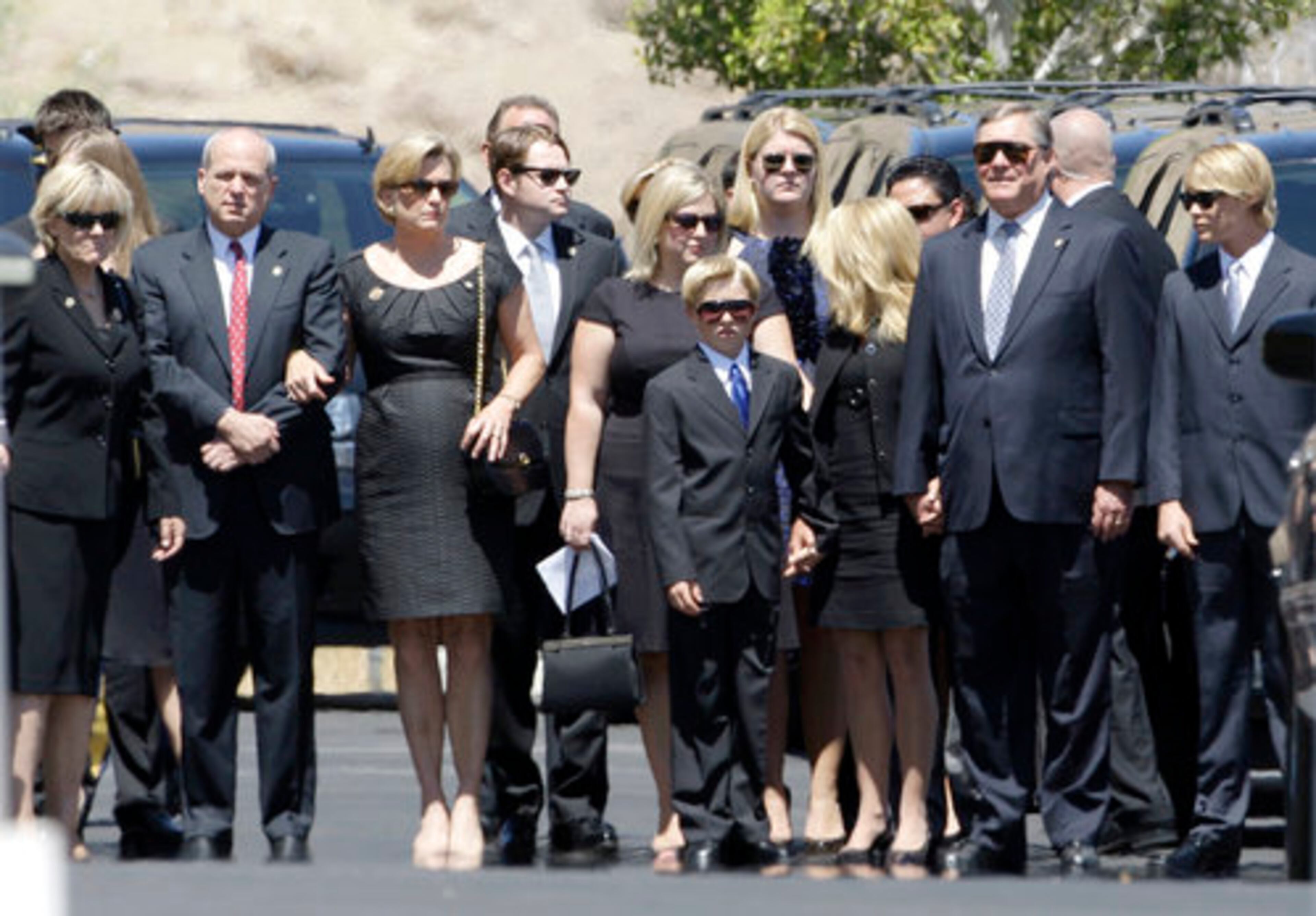 Ford family members prepare to enter the funeral of former first lady Betty Ford.