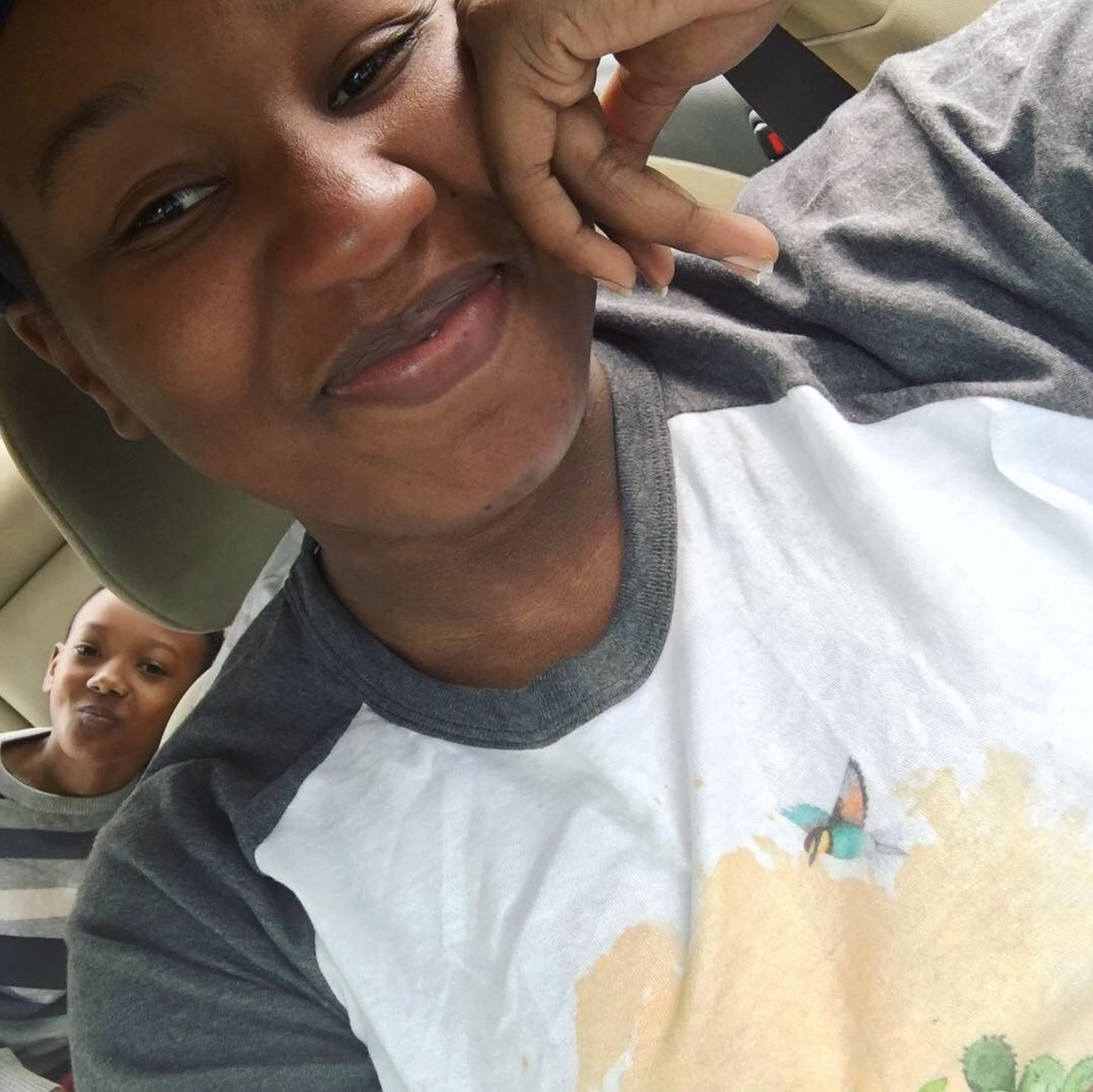 Katherine Juhan-Arnold is the founder of Baby Katie’s Pharm & Kitchen. Peeking over her shoulder is her 10-year-old son, Anthony Juhan Smith. (Contributed)