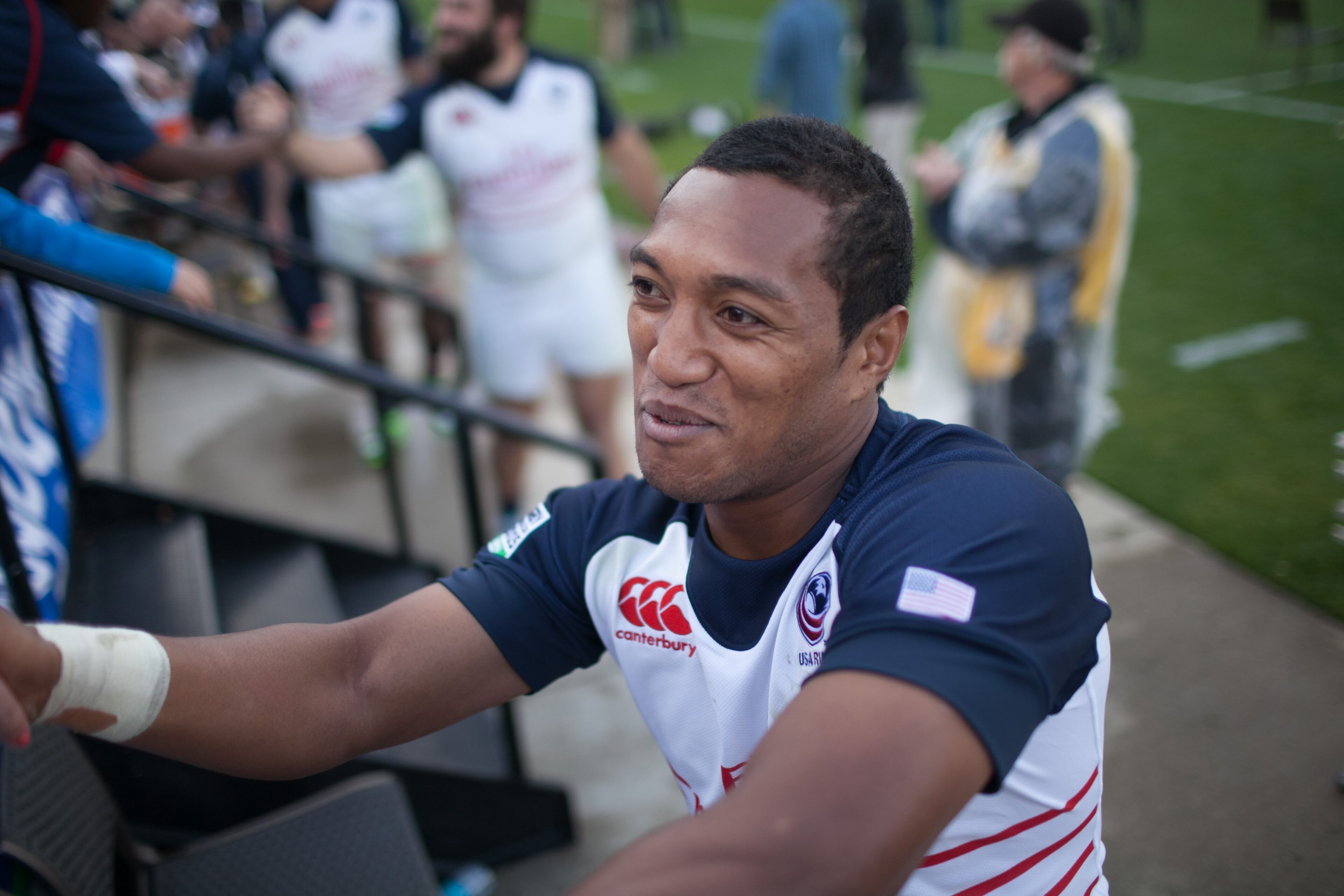 USA's Shalom Suniula greets fans after USA defeated Uruguay Saturday, March 29, 2014, in Kennesaw Ga. (SPECIAL/BRANDEN CAMP)