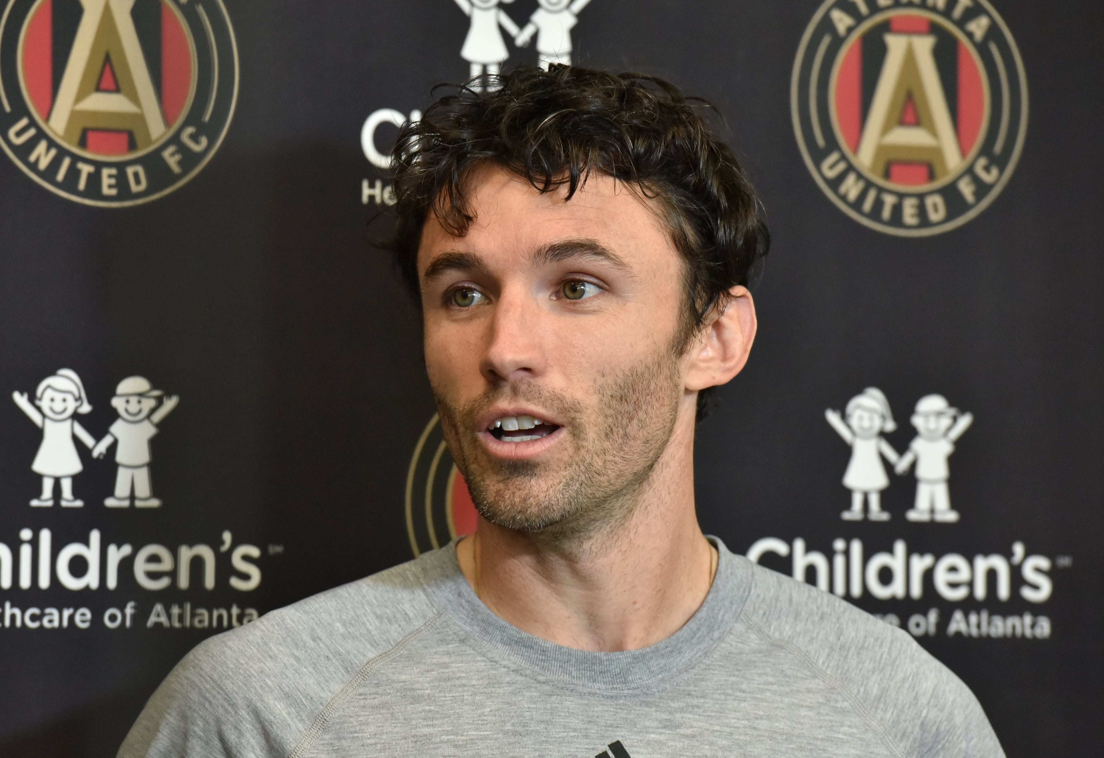 Defender Michael Parkhurst speaks to members of the press prior to Tuesday's practice at Children's Healthcare of Atlanta Training Ground in Marietta. (Hyosub Shin/hshin@ajc.com)
