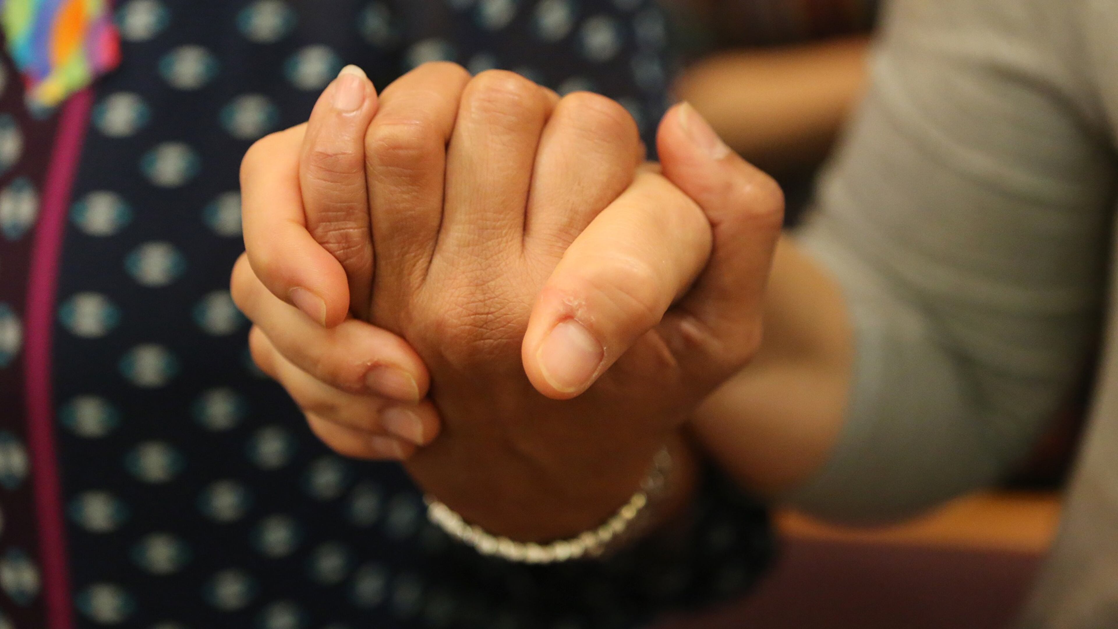 Church members hold hands during a prayer and vigil for the 49 victims at Christ Church Unity in Orlando on Wednesday. Curtis Compton/ ccompton@ajc.com