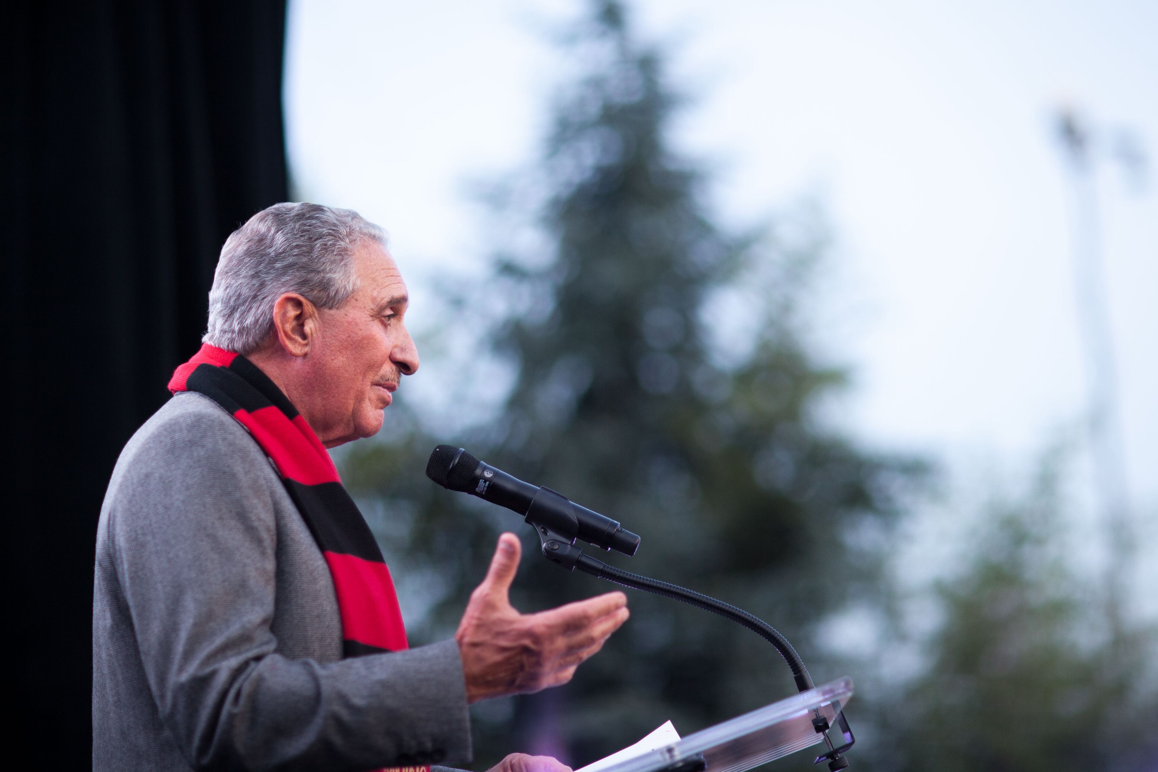 Atlanta Falcons owner Arthur Blank speaks to fans during a party at which Atlanta United FC was announced as the name of an MLS soccer expansion team, Tuesday, July 7, 2015, in Atlanta. The team is scheduled to begin to play in 2017 at the city's new retractable-roof stadium. (AP Photo/Branden Camp)