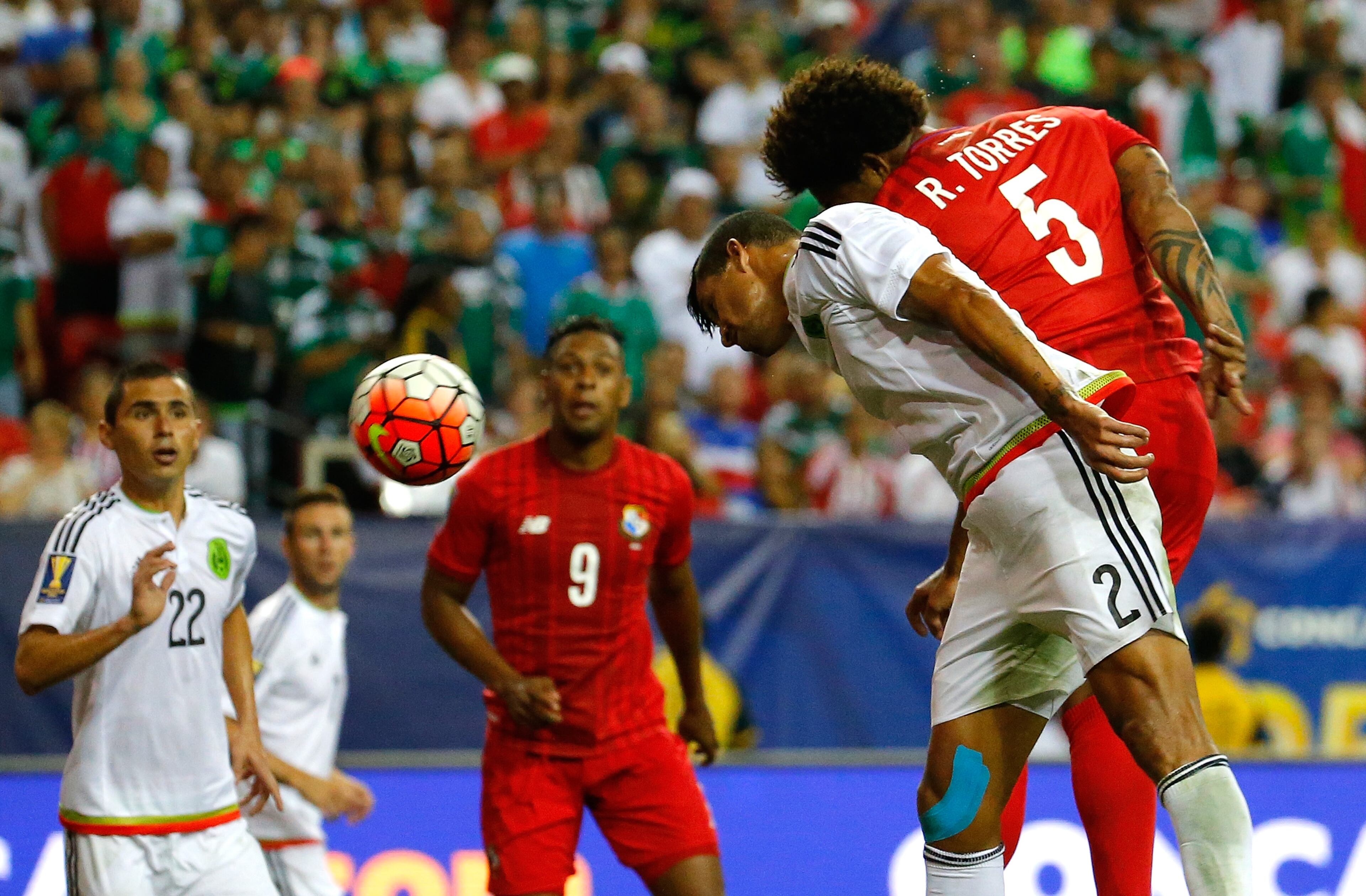Roman Torres #5 of Panama scores the opening goal against Francisco Rodriguez #2 of Mexico during the 2015 CONCACAF Golf Cup Semifinal match between Mexico and Panama at Georgia Dome on July 22, 2015 in Atlanta, Georgia. (Photo by Kevin C. Cox/Getty Images)