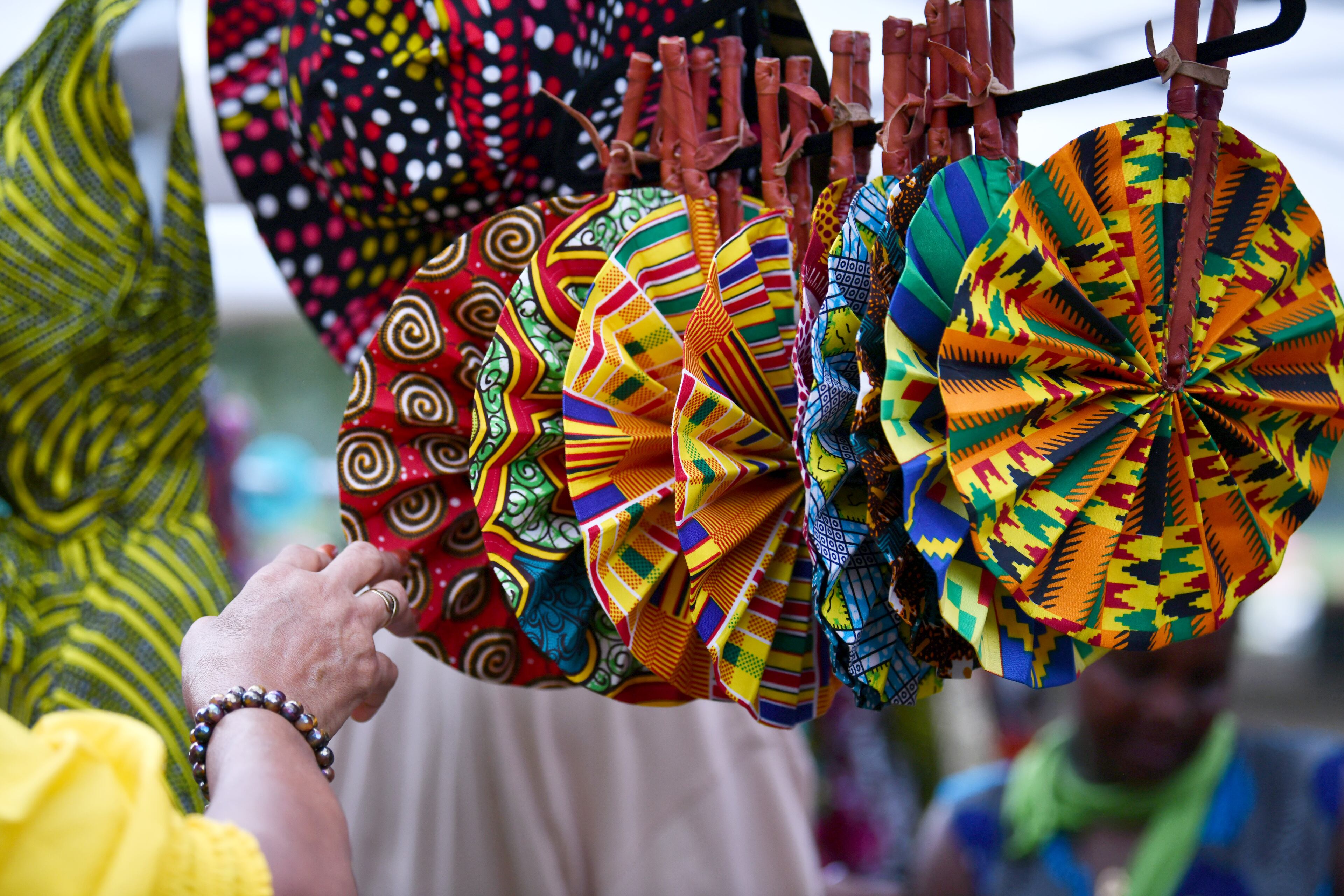 Festival goers enjoy arts and foods during the 10 year anniversary of the BeREGGAE Music and Arts Festival at Piedmont Park, Saturday, August 12, 2023, in Atlanta. The 10th anniversary of the BeREGGAE Music and Arts Festival arrives August 11th -13th. BeREGGAE Festival was established in 2013 and has organically grown into one of the largest 3 DAY Reggae / Caribbean music festivals in the country and hosts thousands of families in free and safe environment. (Hyosub Shin / Hyosub.Shin@ajc.com)