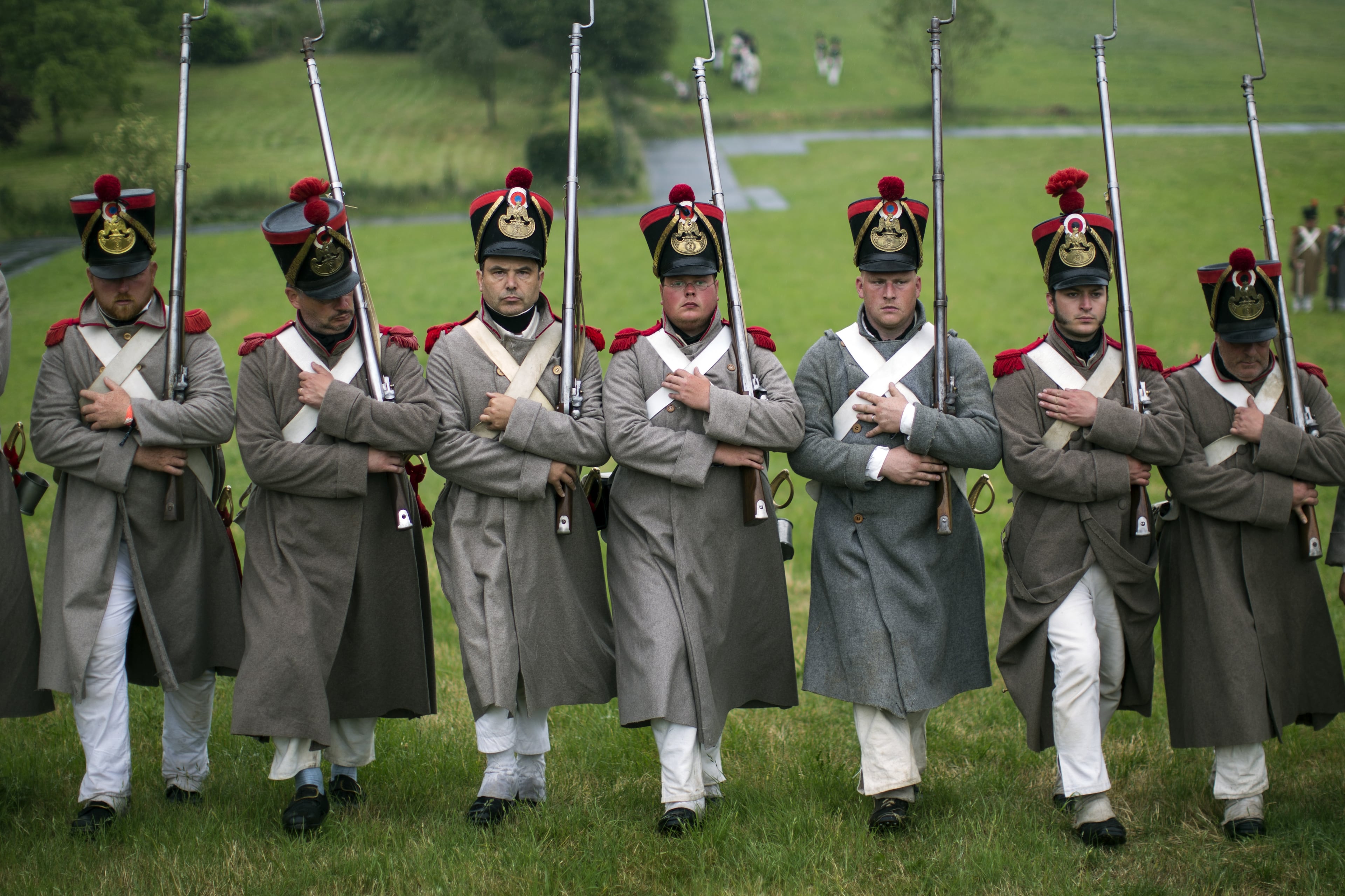 WATERLOO, BELGIUM - JUNE 18: Historical re-enactors take part in a practice drill in the French Bivouac camp on June 18, 2015 in Waterloo, Belgium. Around 5000 historical re-enactors from around the world will take part in three days of events from June 18, 2015 to mark the 200th anniversary of the Battle of Waterloo. The 1815 battle saw the overthrow of Napoleon Bonaparte and the restoration of Louis XVIII to the French throne. (Photo by Dan Kitwood/Getty Images)