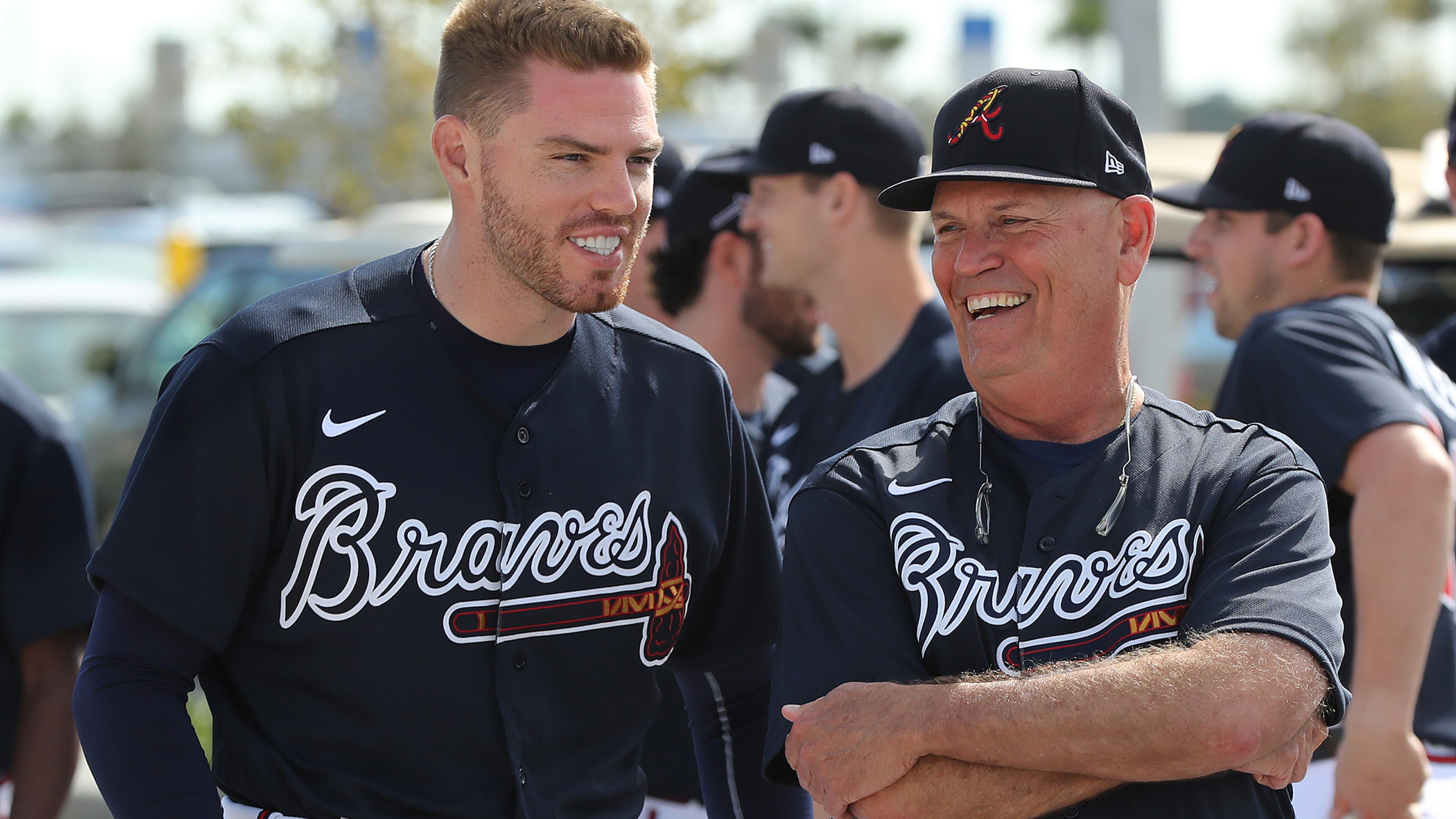 Braves first baseman Freddie Freeman (left) and manager Brian Snitker share a laugh during a workout Tuesday, Feb. 18, 2020, at CoolToday Park in North Port, Fla.
