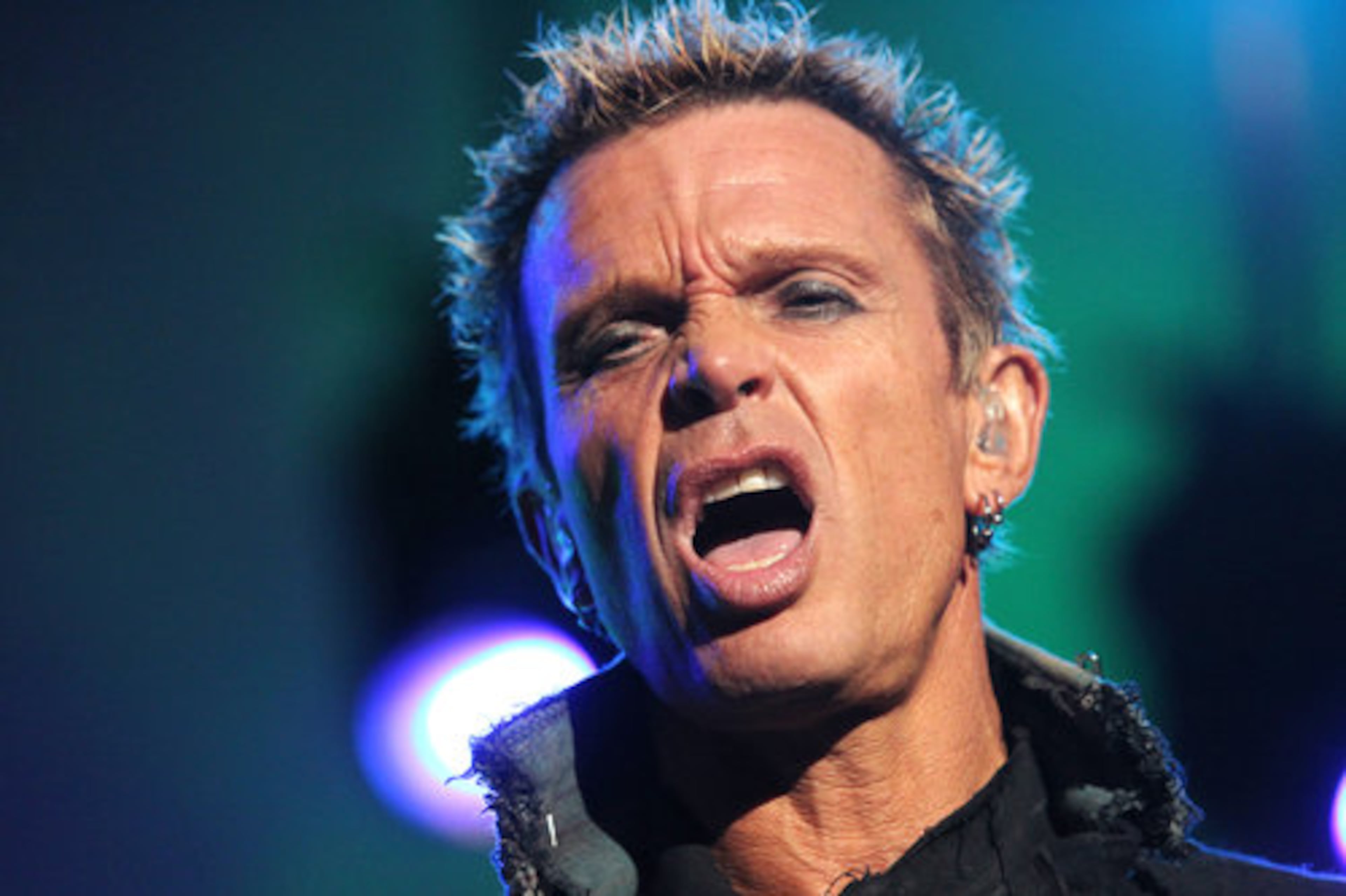 English rock musician Billy Idol performs at Chastain Park Amphitheatre in Atlanta on Sunday, August 29, 2010. William Michael Albert Broad was born November 30, 1955 and first achieved fame in the punk rock era as a member of the band Generation X. He then embarked on a solo career with stylish music videos like "White Wedding" and "Dancing with Myself" making him one of the first MTV stars. Idol continues to tour with guitarist Steve Stevens.