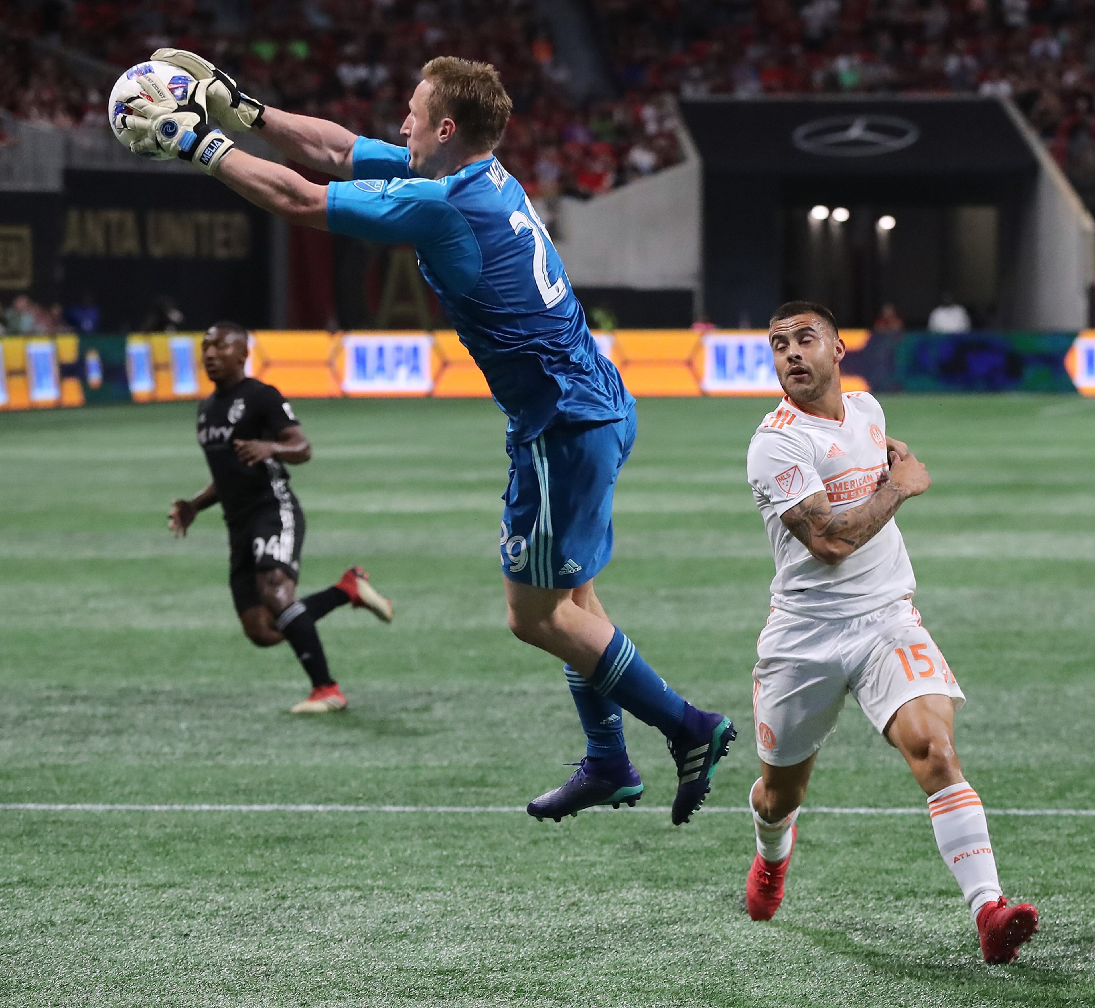 May 9, 2018 Atlanta: Sporting Kansas City goalkeeper Tim Melia blocks the shot with Atlanta United forward Hector Villalba looking on during the first half in a MLS soccer match on Wednesday, May 9, 2018, in Atlanta. Curtis Compton/ccompton@ajc.com