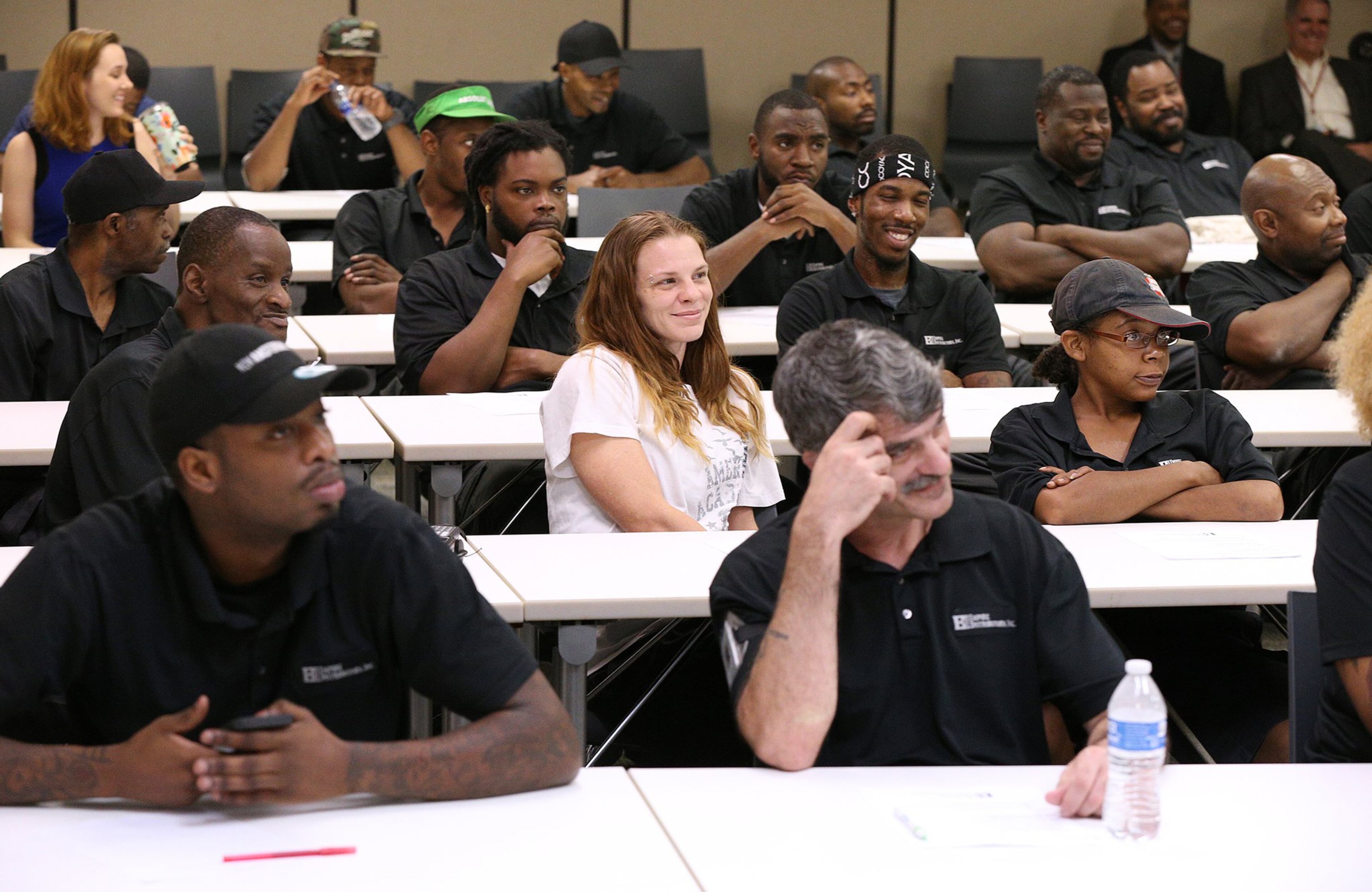Empire Distributors employees attend a recent personal financial wellness event at the company in Atlanta. Curtis Compton/ccompton@ajc.com