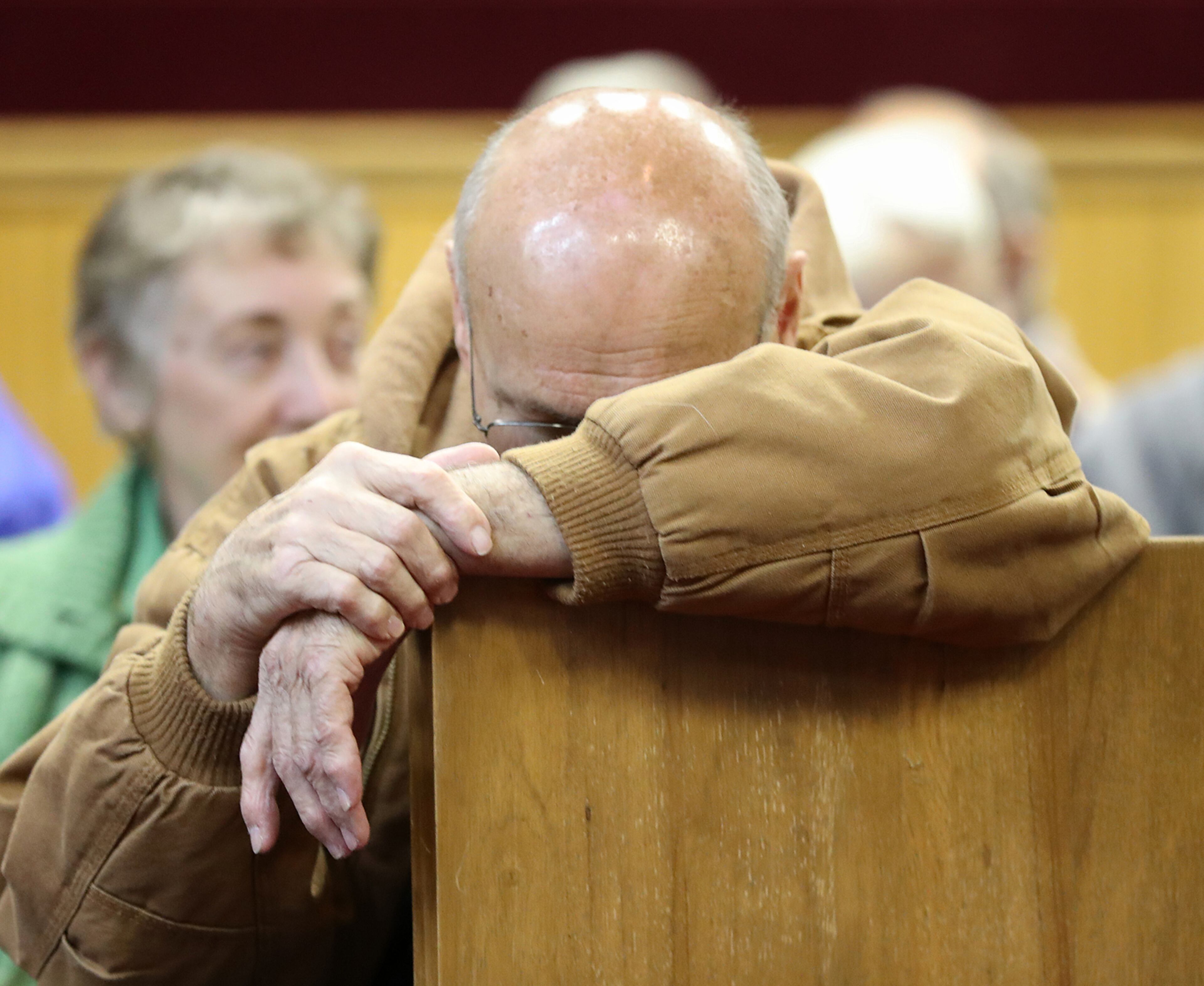 November 21, 2016, Clayton: Albert Neimann, Rabun Gap, reacts as he finds out the Rock Mountain Fire is approaching Betty's Creek Road during a community meeting with fire officials at the Rabun County Courthouse on Monday, Nov. 21, 2016, in Clayton. Neimann has an elderly friend that lives on the road he is concerned for. The area is under a pre-evacuation order. Curtis Compton/ccompton@ajc.com