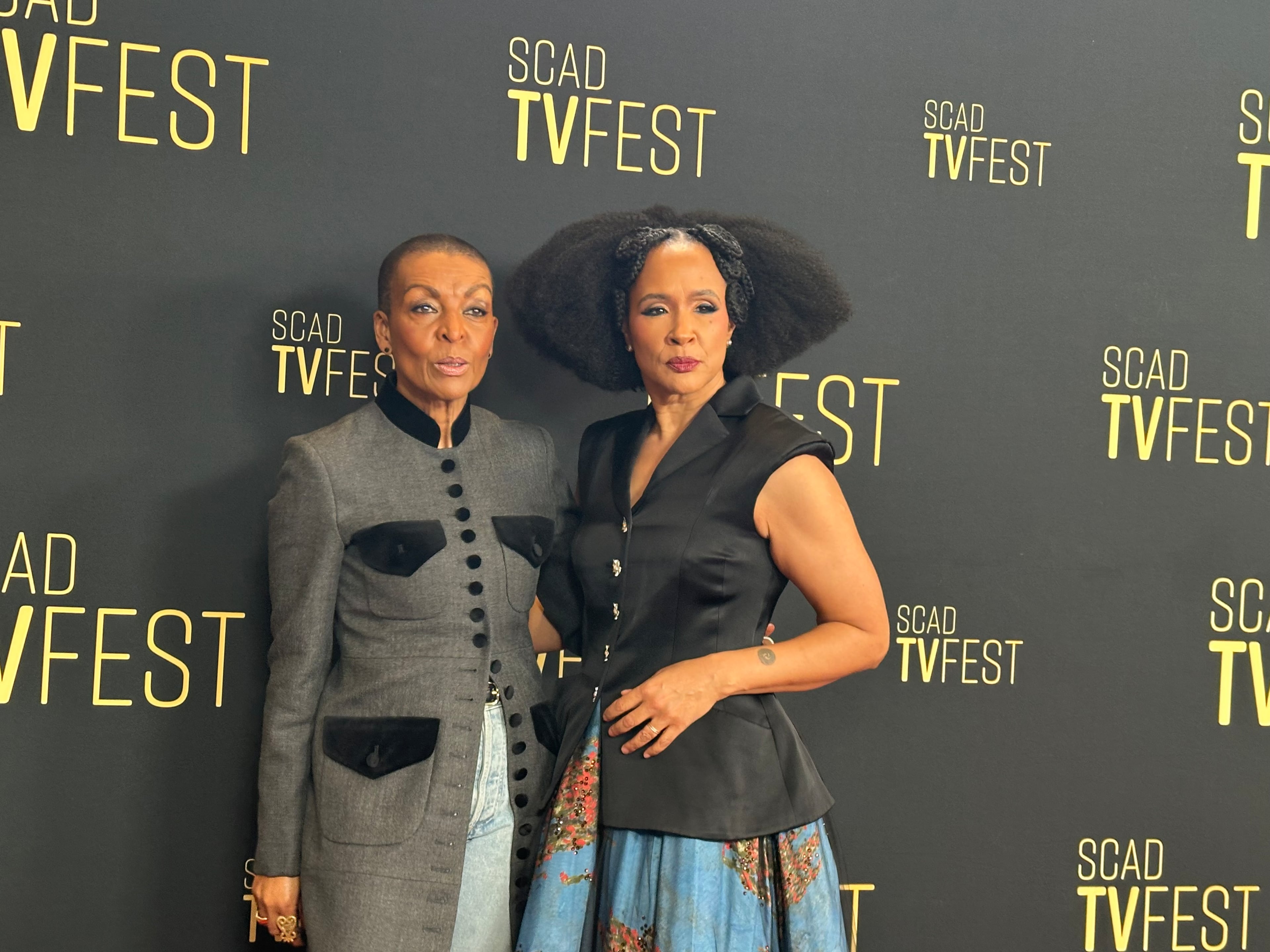 "Bridgerton" actors Adjoa Andoh (left) who plays Lady Danbury and Golda Rosheuvel who plays Queen Charlotte work the red carpet for 2026 SCAD TVfest, Feb. 4, 2026 at the Four Seasons Hotel in Midtown Atlanta.(Rodney Ho/AJC)