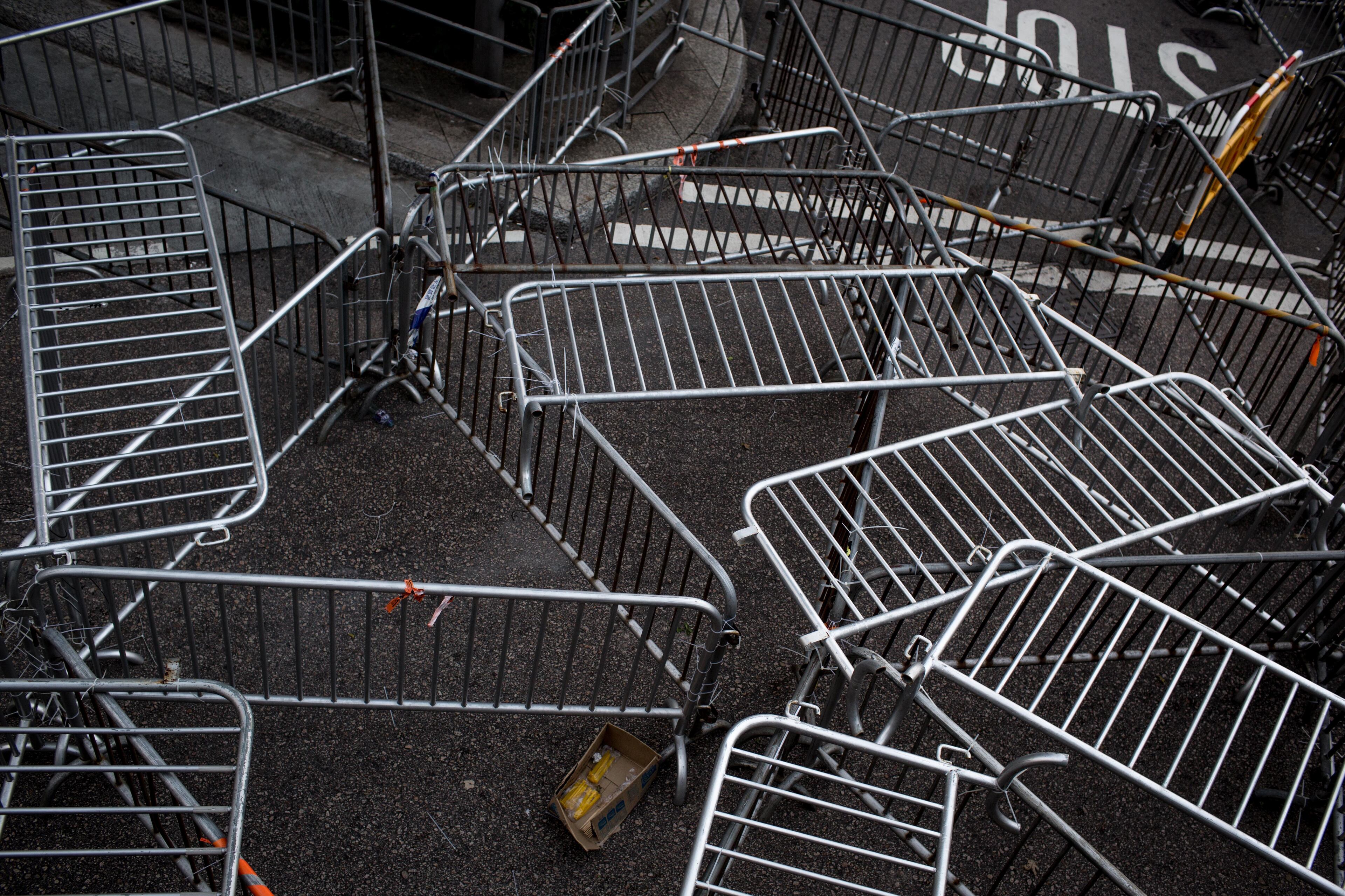A makeshift barricade is seen blocking a road into the pro-democracy protest site on October 7, 2014 in Hong Kong, Hong Kong. With many protesters returning to work and school, supporter numbers have dwindled leaving a small number defying the governments request to leave the area. Student leaders and government officials agreed today to hold talks to end the two week protests. (Photo by Chris McGrath/Getty Images)