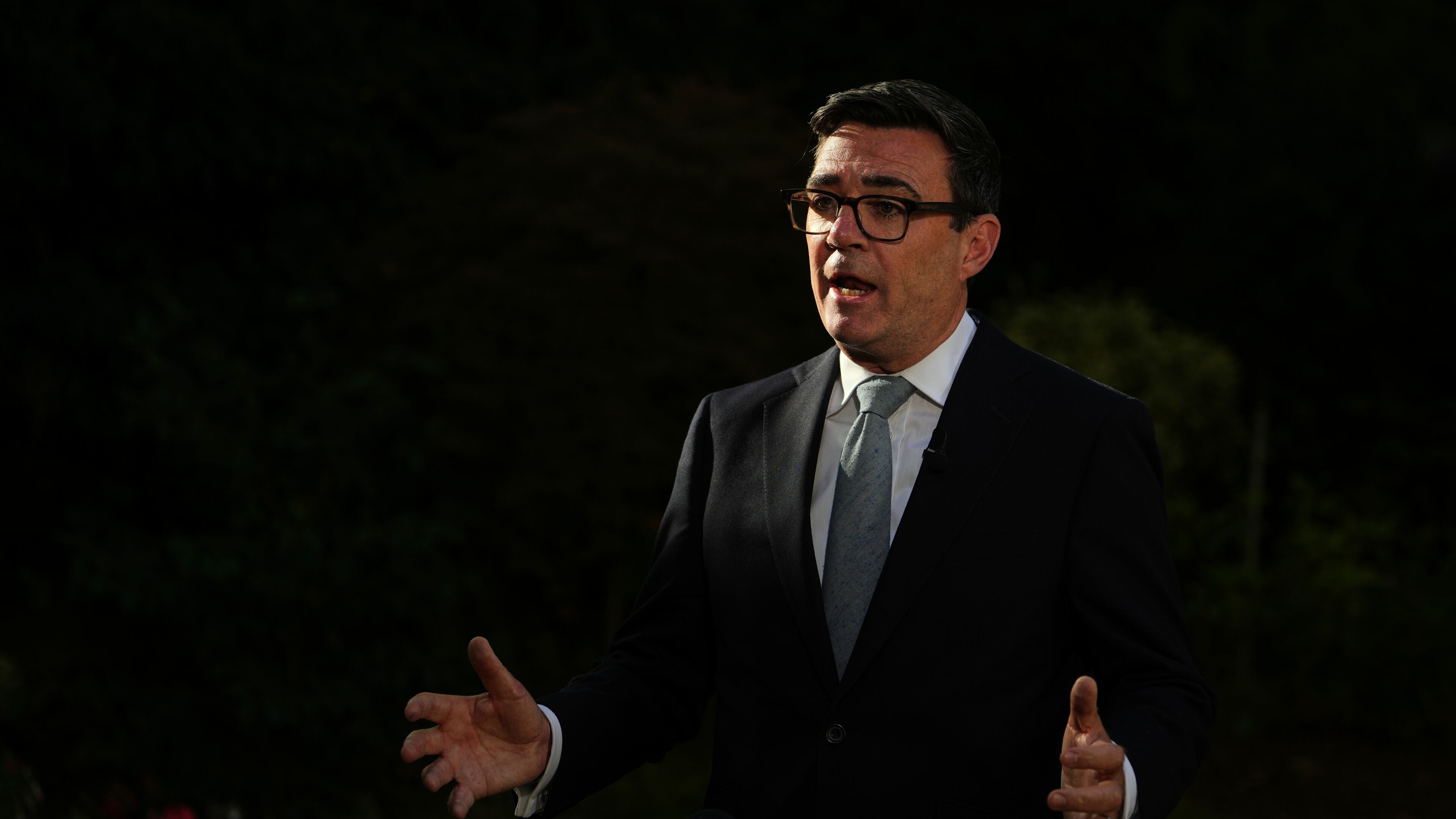 Britain's Prime Minister Andy Burnham speaks to the media after chairing a COBR meeting at Downing Street on the UK's ongoing response to extreme heat, wildfires and drought in London, Wednesday, Aug. 12, 2026.(AP Photo/Kin Cheung, Pool)