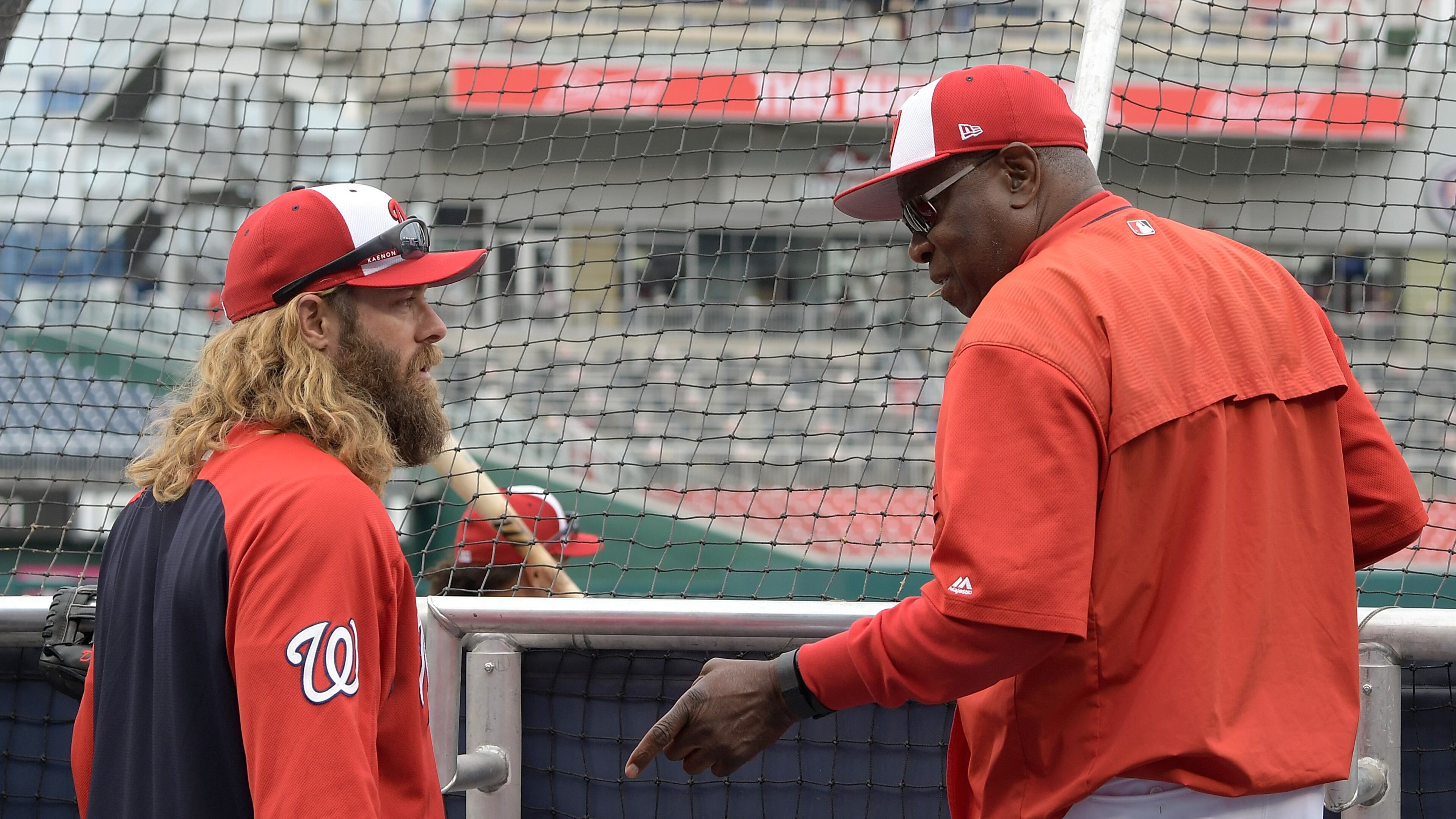 Manager Dusty Baker (right) of the Washington Nationals talks with Jayson Werth during batting practice before the game against the Miami Marlins at Nationals Park on April 5, 2017 in Washington. (Photo by Greg Fiume/Getty Images)