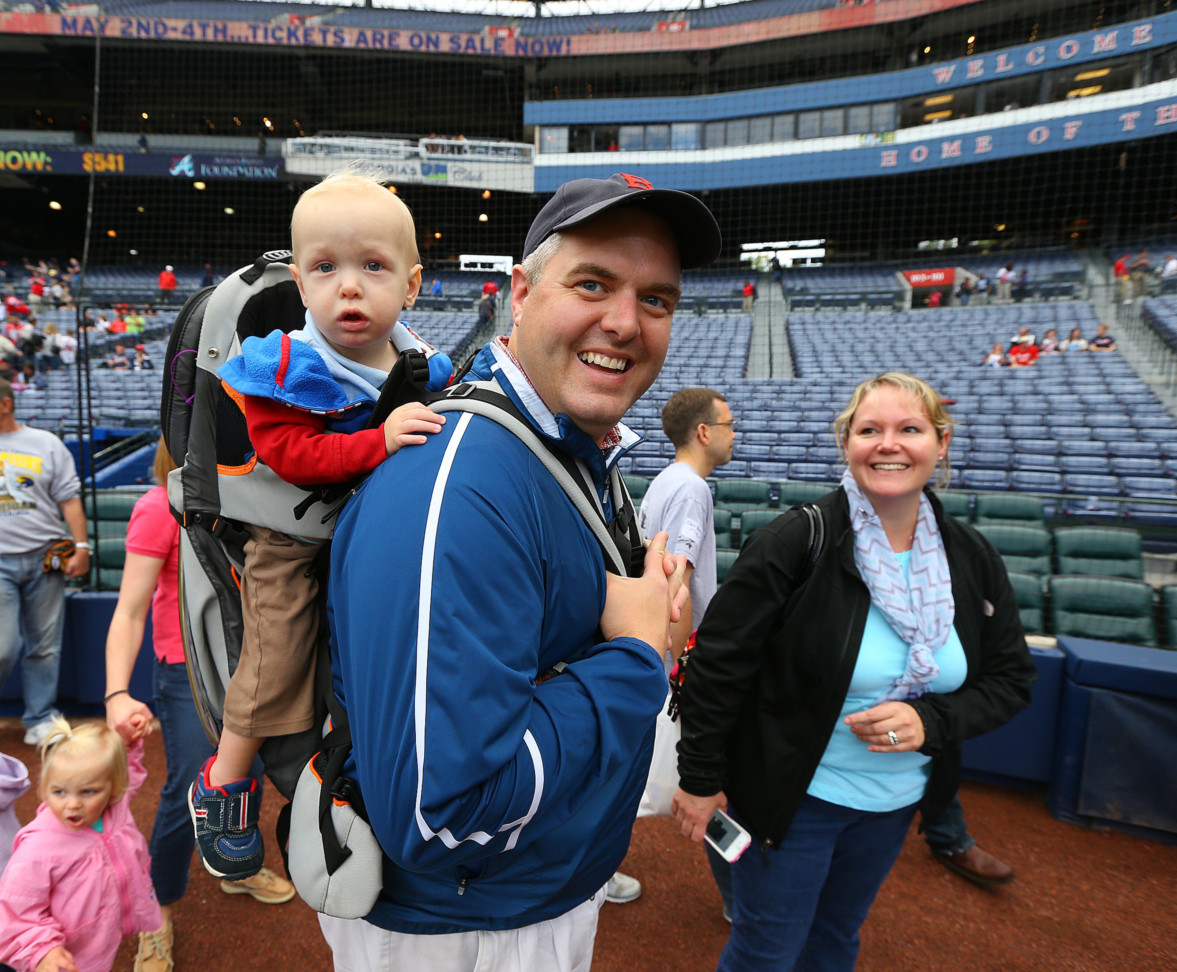 Ashley and John Shepardson and their 22-month-old son Zach, who has congenital heart disease, take in the Braves game with Children's Healthcare of Atlanta on Tuesday, April 22, 2014, in Atlanta. CURTIS COMPTON / CCOMPTON@AJC.COM