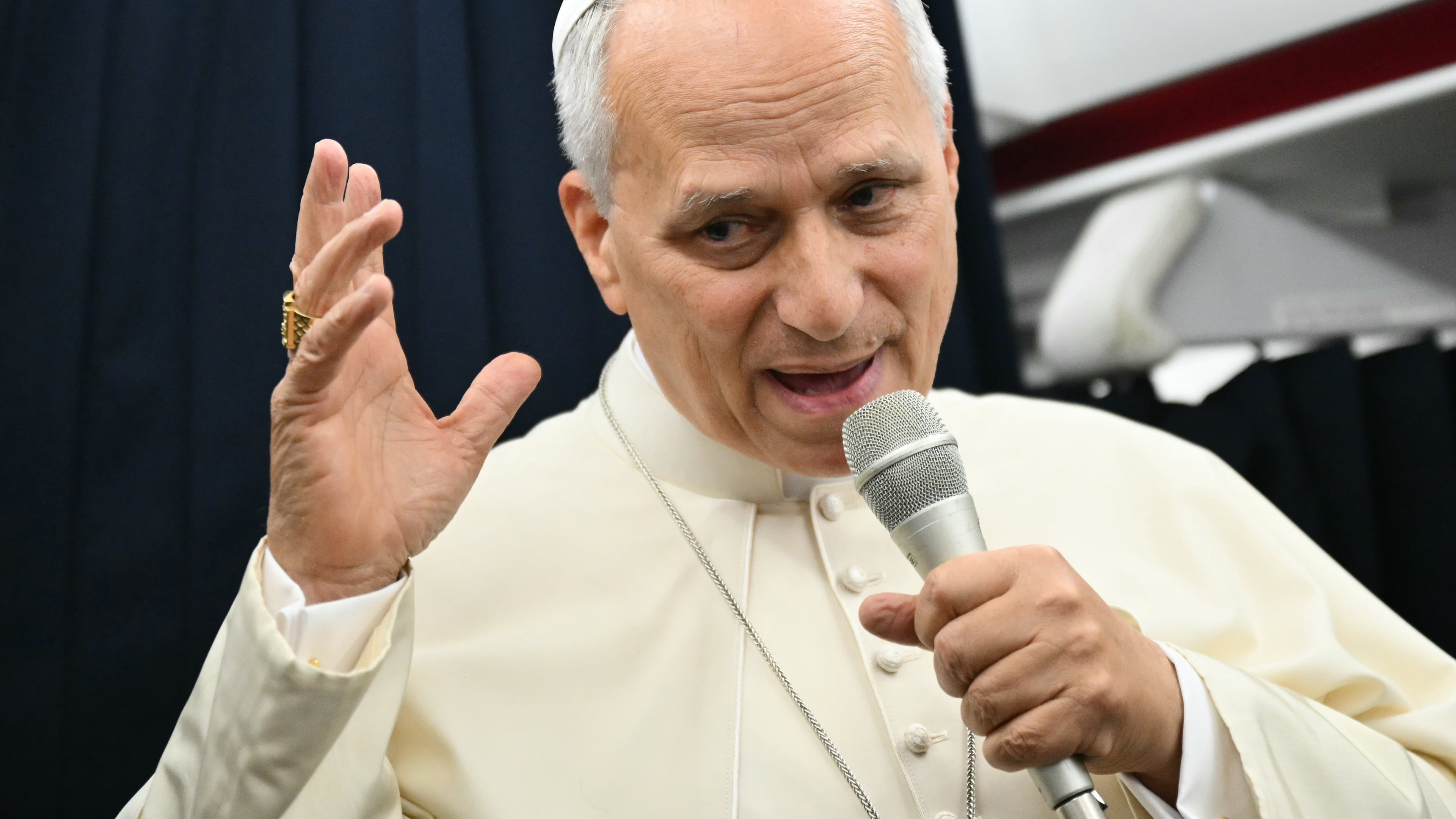 Pope Leo XIV speaks to journalists aboard the flight from Metz, France, to Rome, at the end of his four-day visit to France, Monday, Sept. 28, 2026. (Alberto Pizzoli/Pool Photo via AP)