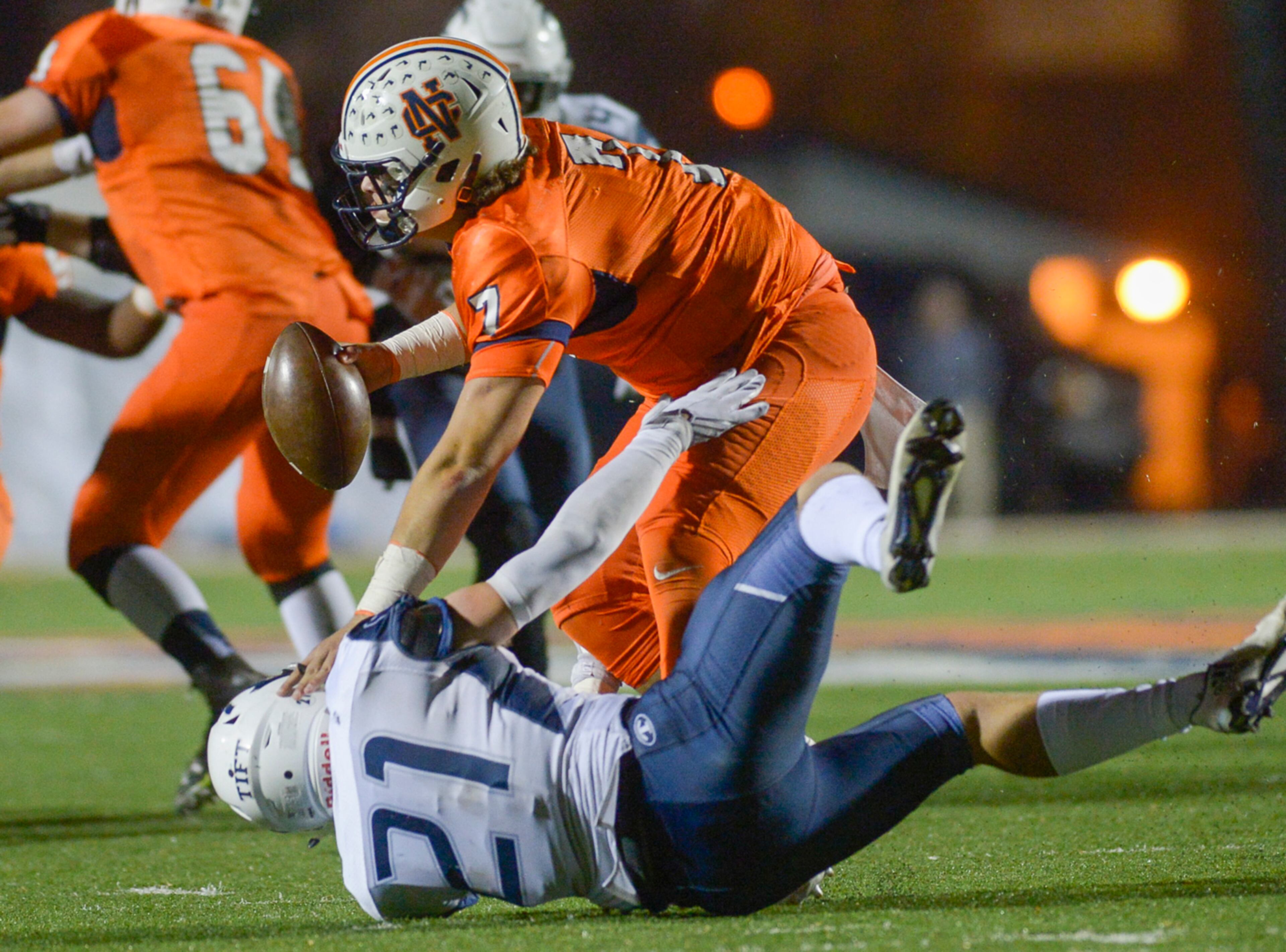 Kennesaw, Ga. -- Tift County senior LB Eric Atkins (21) fails to make a sack on North Cobb senior QB Will Lovett (7) in the second half of their game at North Cobb Friday November 11, 2016. SPECIAL/Daniel Varnado