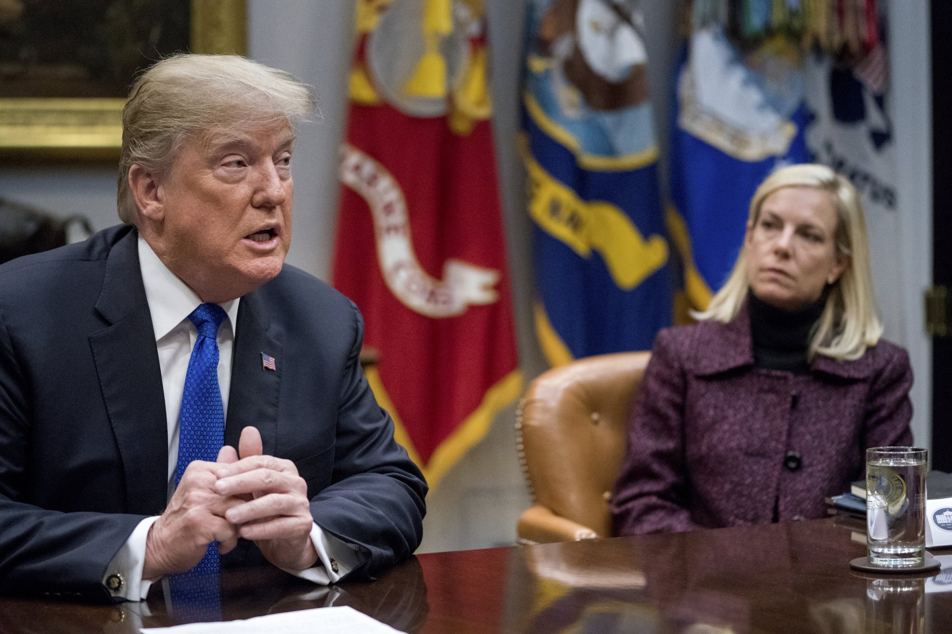 President Trump, with Secretary of Homeland Security Kirstjen Nielsen, right, speaks during a meeting with Republican Senators on immigration at the White House last week. (AP Photo/Andrew Harnik, File)