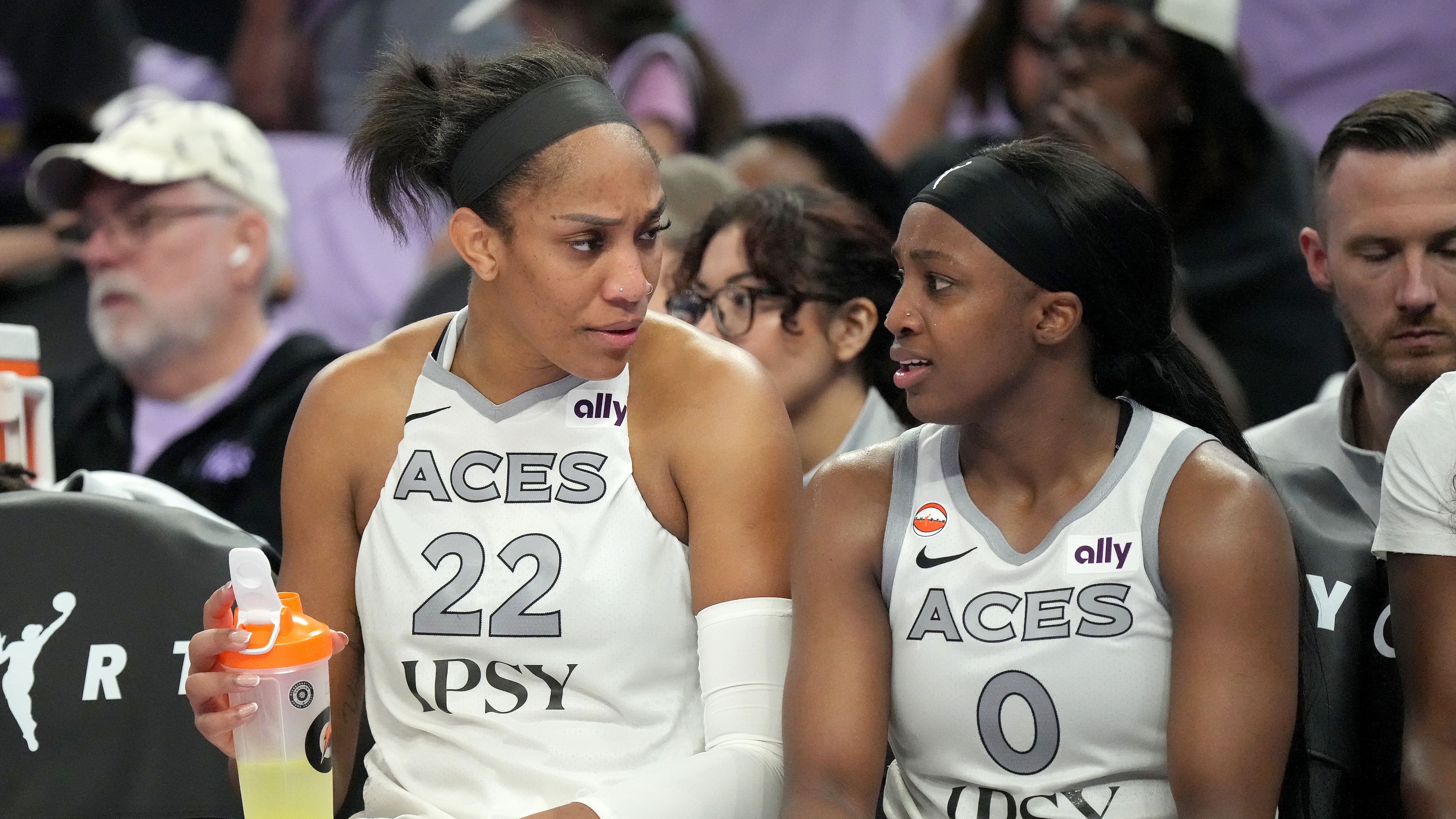 Las Vegas Aces center A'ja Wilson (22) talks with guard Jackie Young (0) on the bench in the final seconds of Game 1 of the WNBA basketball semifinals against the Golden State Valkyries in San Francisco, Sunday, Oct. 4, 2026. (AP Photo/Tony Avelar)