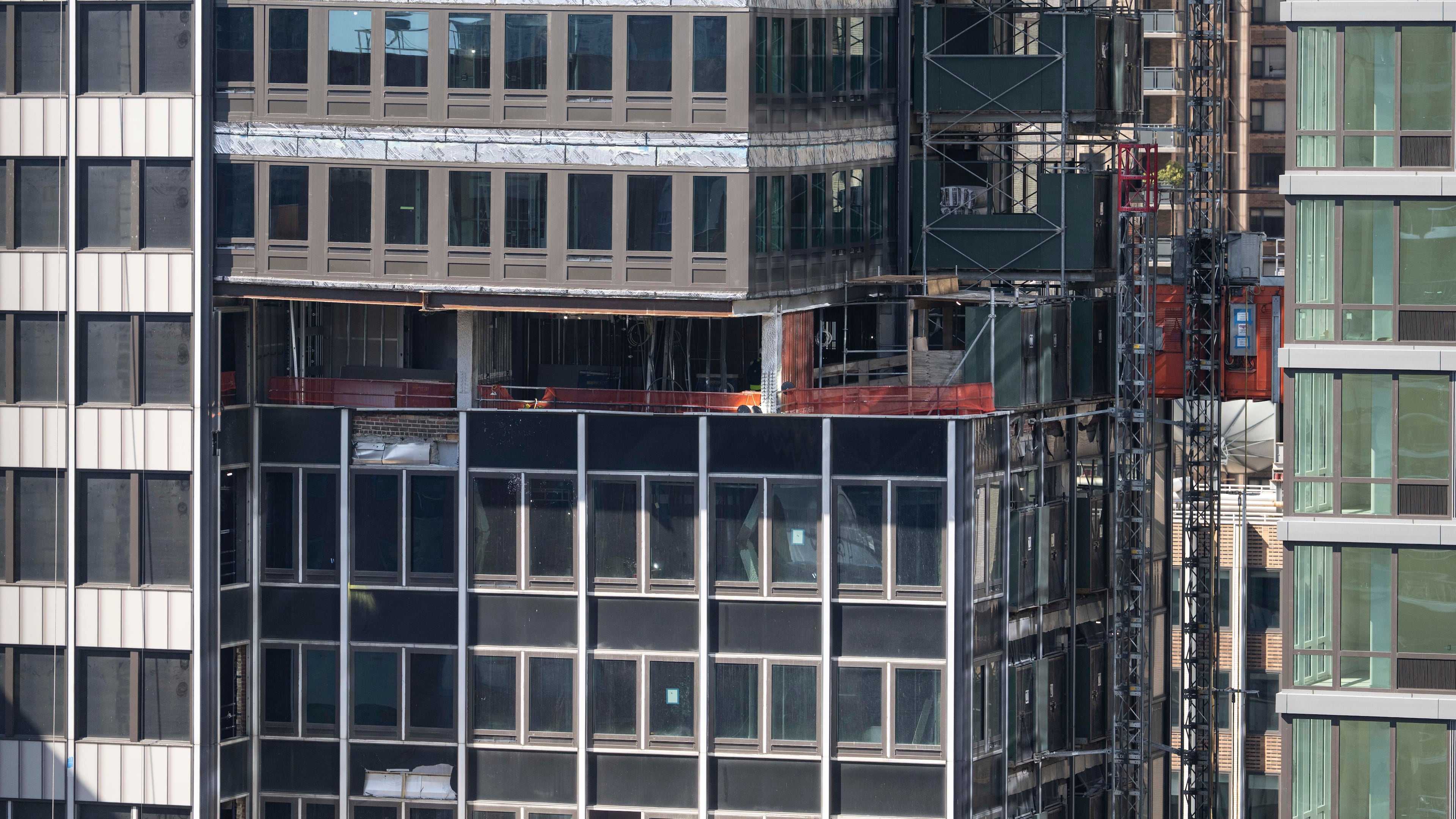A buckled support beam is seen inside 235 East 42nd Street, Wednesday, July 8, 2026, in New York. (AP Photo/Yuki Iwamura)