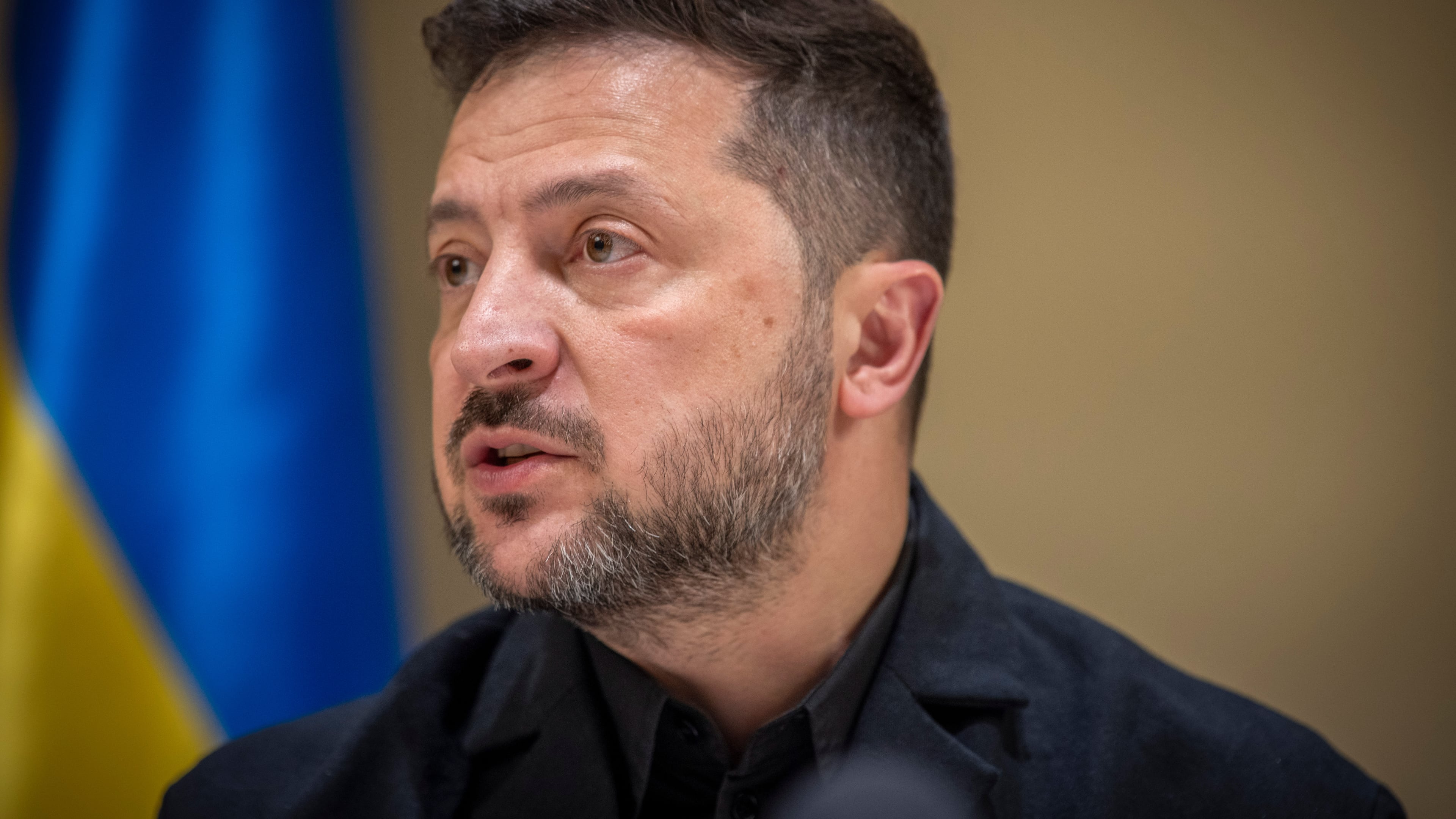 Ukrainian President Volodymyr Zelenskyy speaks to the media after a German-Ukrainian business forum in Kyiv, Ukraine, Sunday, Oct. 4, 2026. (AP Photo/Dan Bashakov)