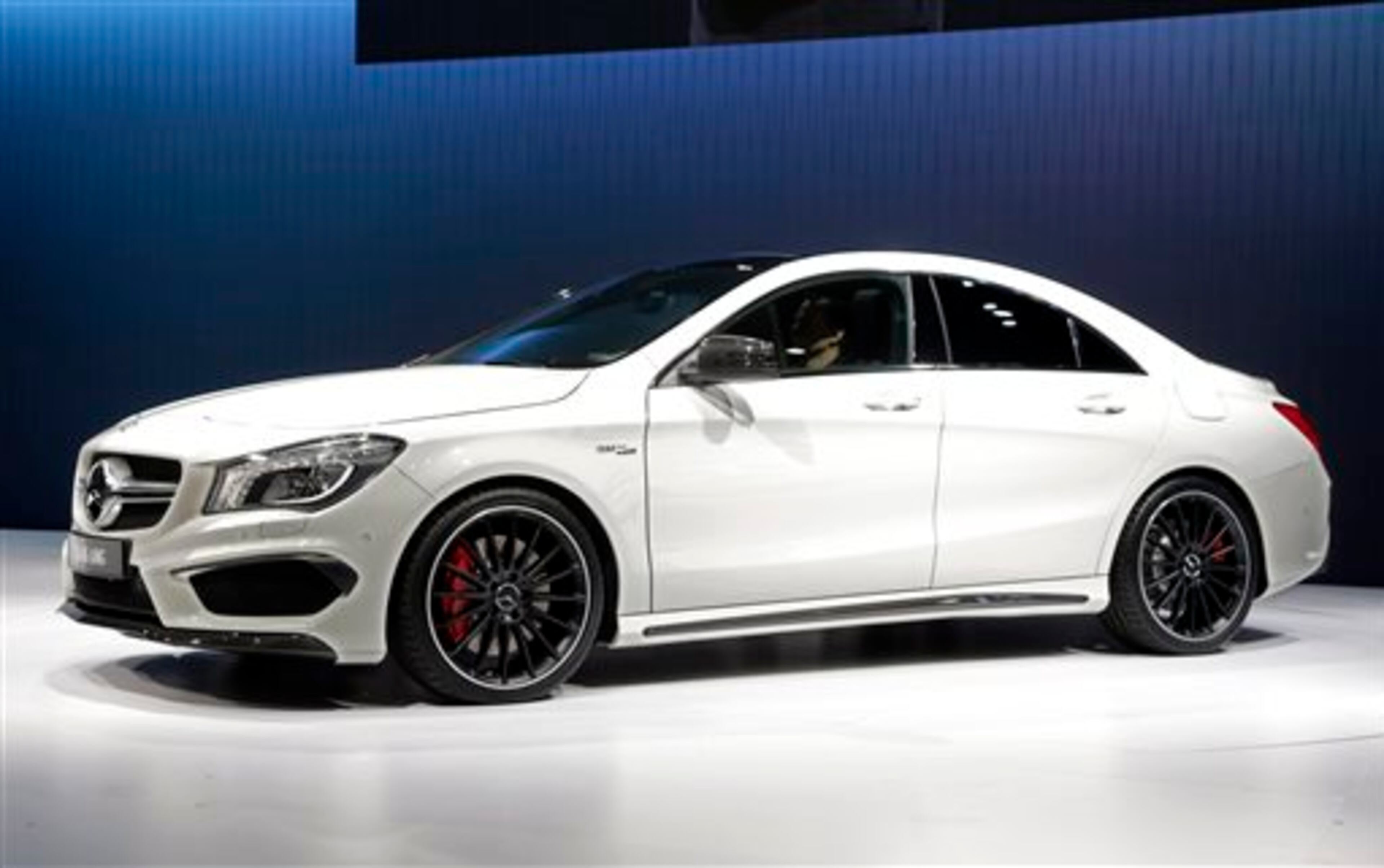 FILE - In this March 27, 2013 file photo, the 2014 CLA 45 AMG Mercedes-Benz is presented at the New York International Auto Show, in the Javits Center, in New York. The CLA 45 AMG all-wheel-drive with 355 horses goes on sale in November. (AP Photo/Richard Drew, File)