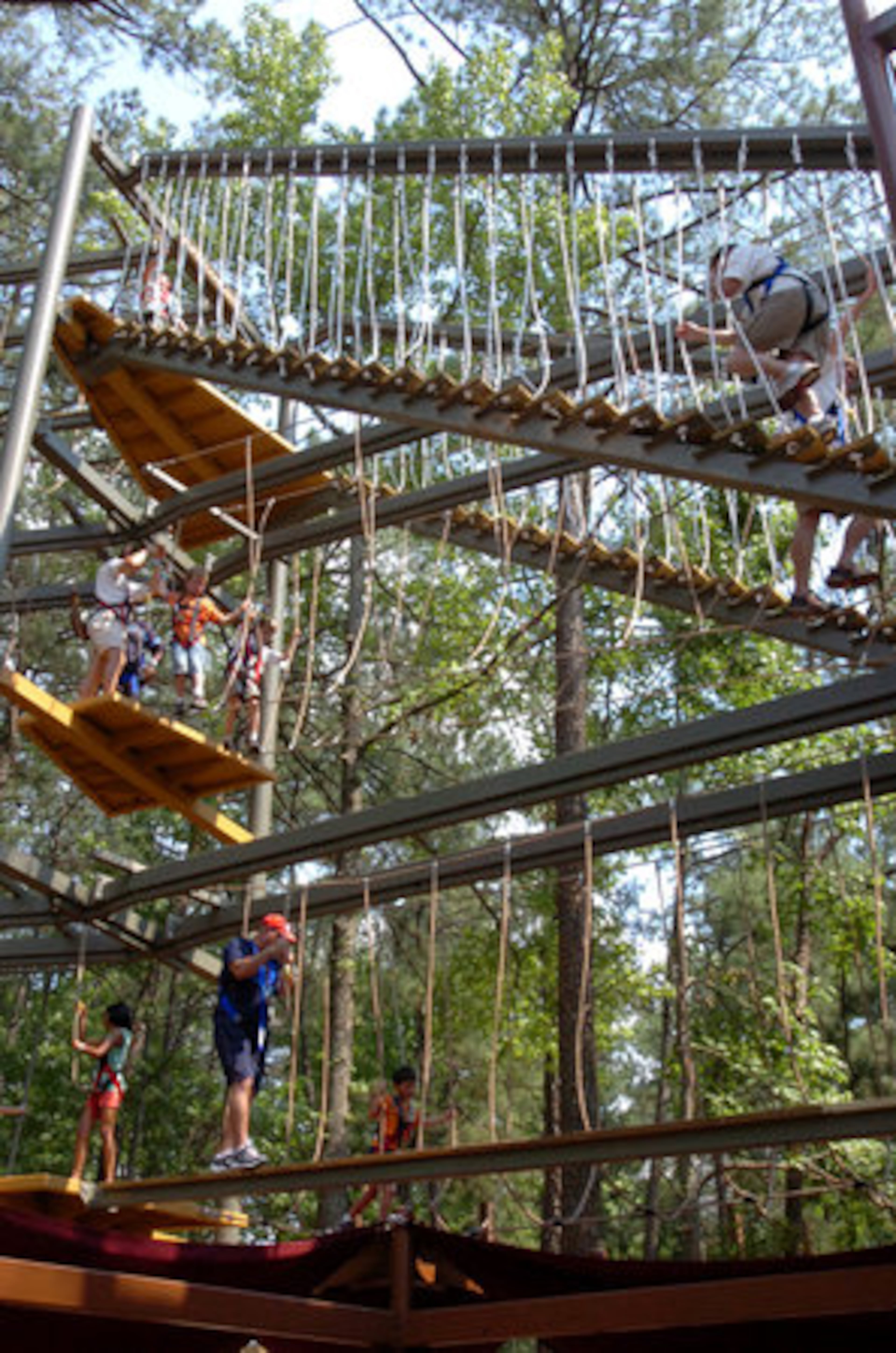 Sky Hike, Stone Mountain Park's newest attraction, is a huge ropes course with three levels: 12 feet, 24 feet and 40 feet. From the ground, it looks like a vast array of platforms, ladders, beams and ropes.