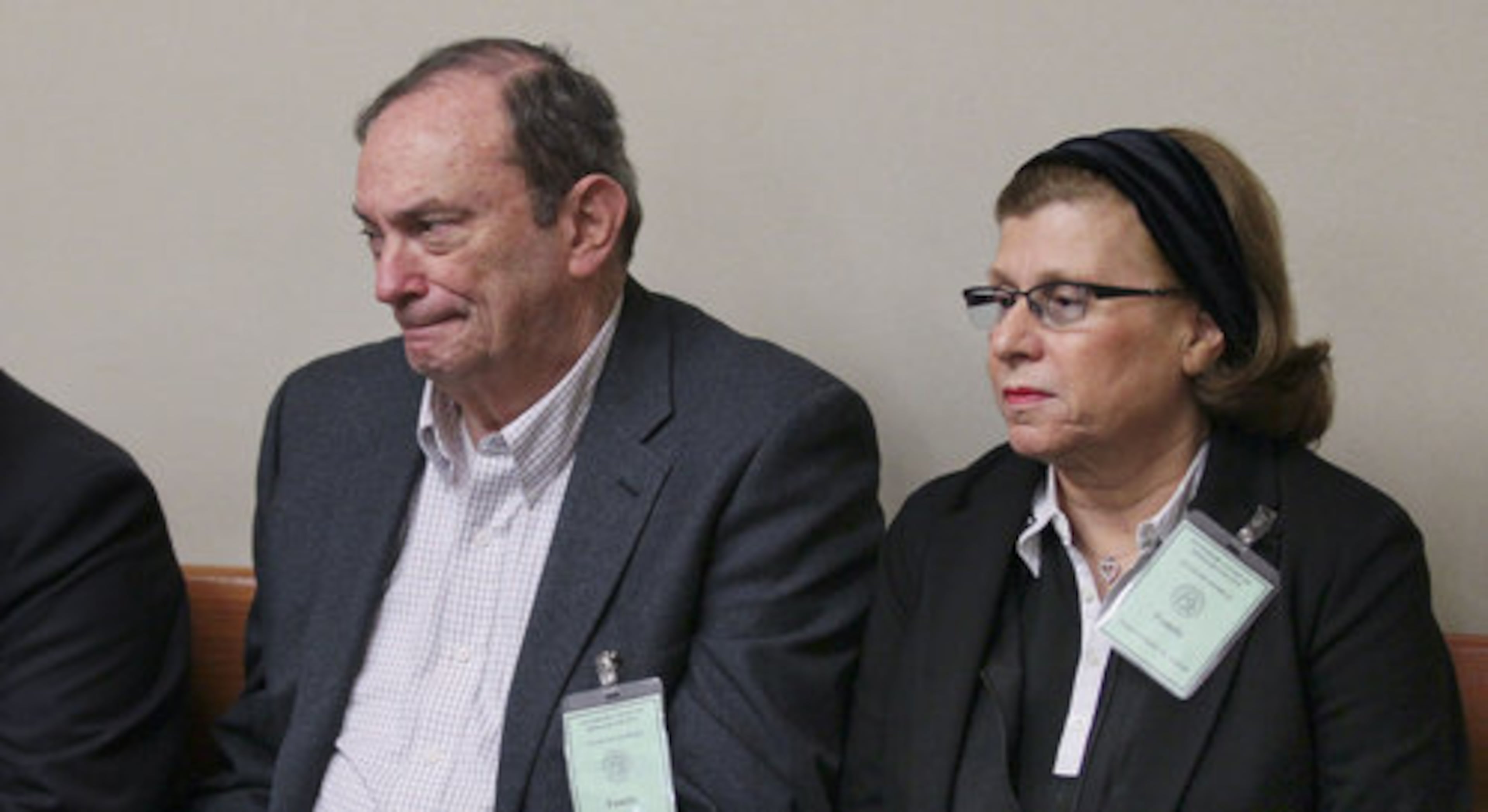 Donald and Marilyn Sneiderman, parents of shooting victim, Rusty Sneiderman, listen as the judge instructs the jury Wednesday before deliberations began.