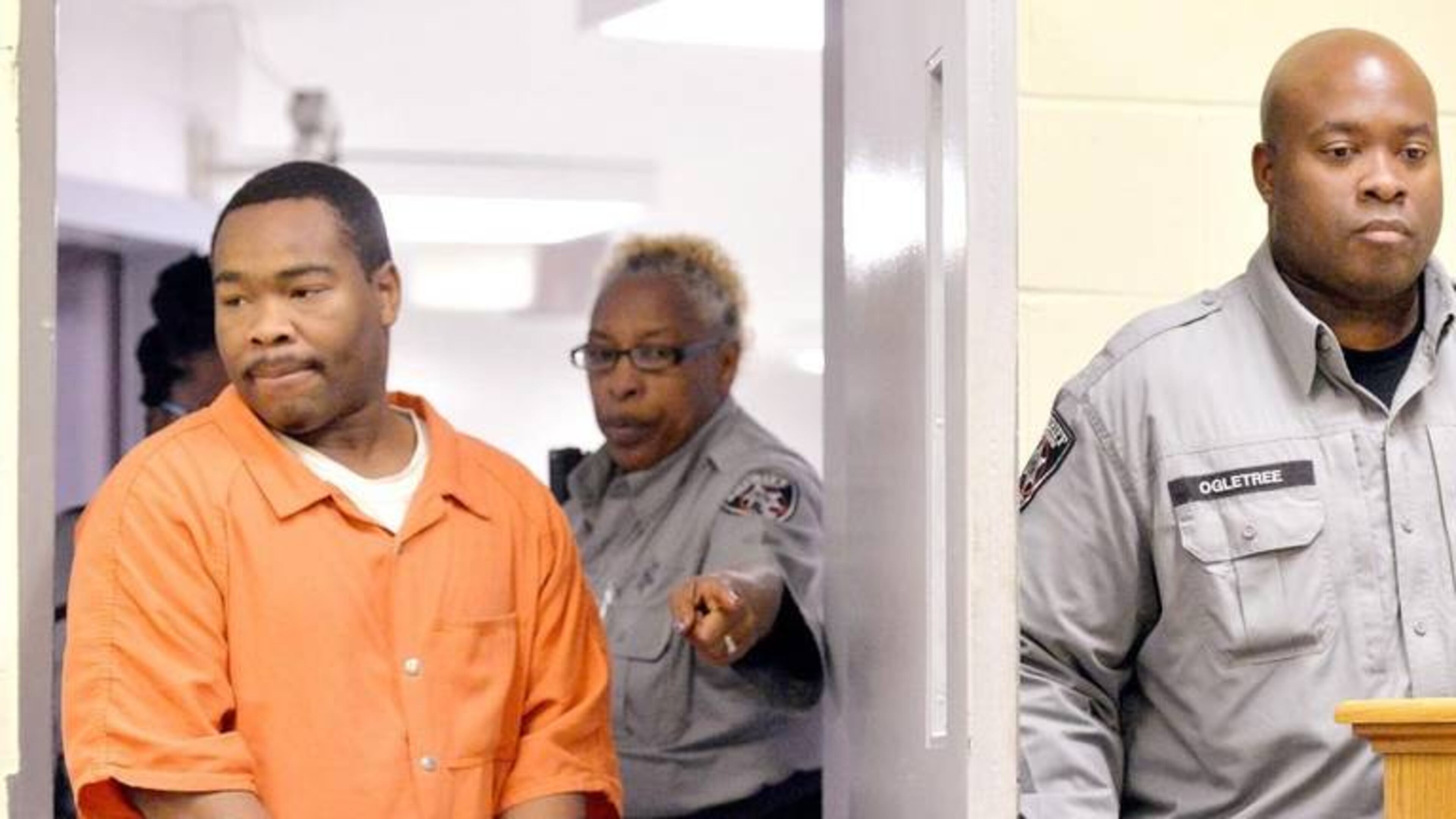 Damion Deray Henderson is led into a Bibb County courtroom for a hearing in March 2016. Henderson is charged with murder in the death of Mercer University basketball player Jibri Bryan. (JASON VORHEES jvorhees@macon.com)