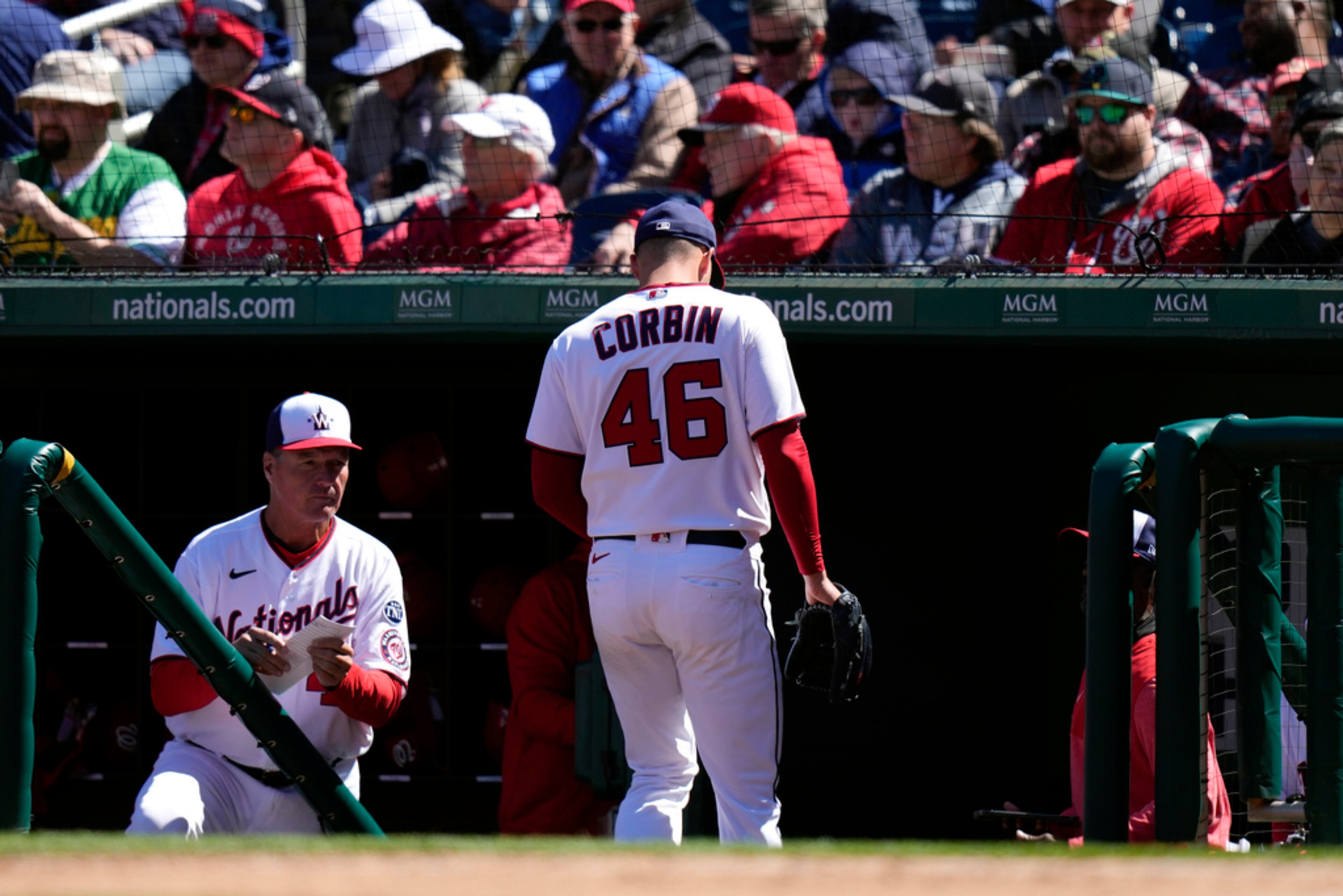 Washington Nationals starting pitcher Patrick Corbin walks into the dugout after being relieved during the fourth inning of an opening day baseball game against the Atlanta Braves at Nationals Park, Thursday, March 30, 2023, in Washington. (AP Photo/Alex Brandon)