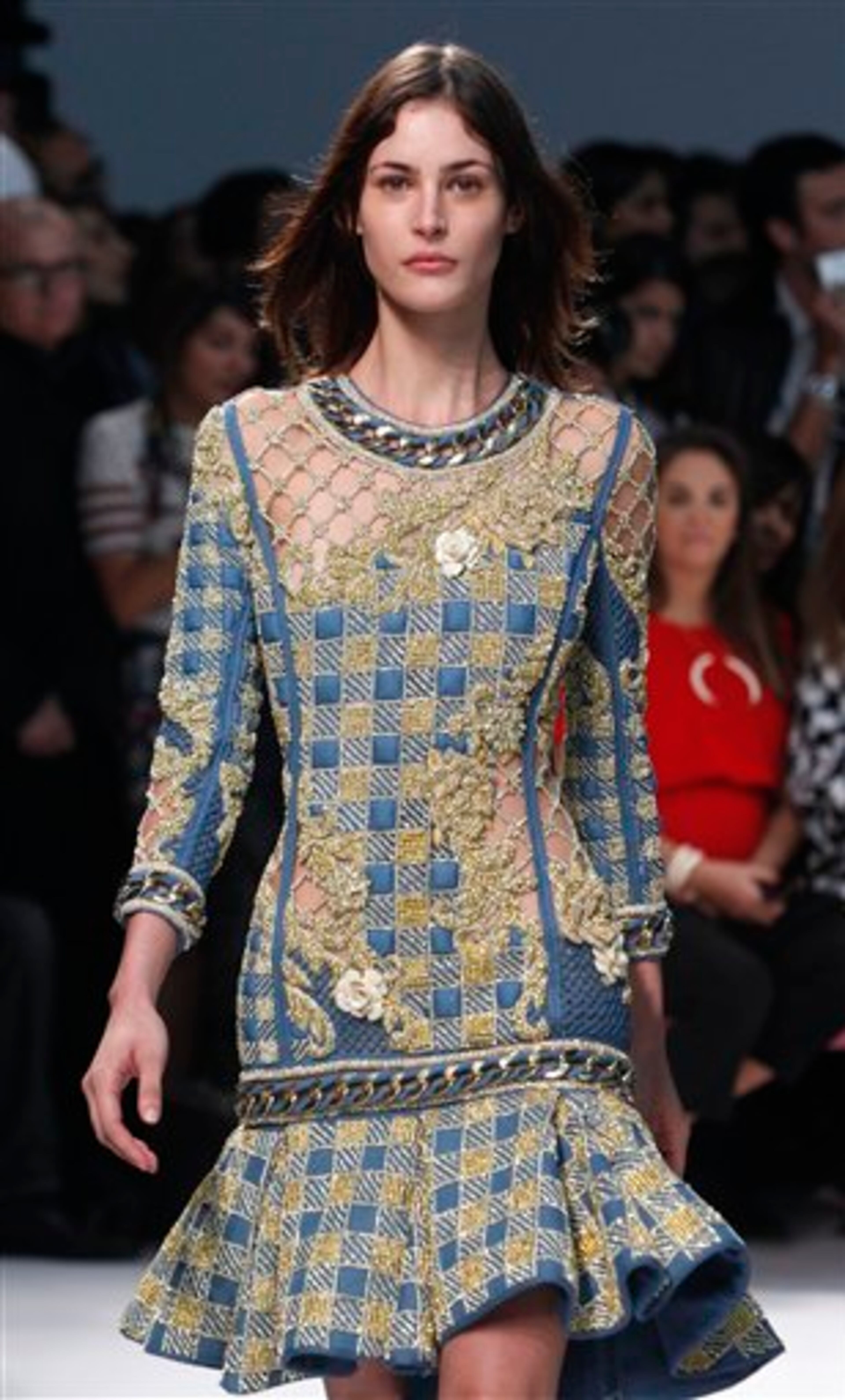 A model wears a creation for Balmain ready-to-wear Spring/Summer 2014 fashion collection, presented in Paris, Thursday, Sept.26, 2013. (AP Photo/Thibault Camus)