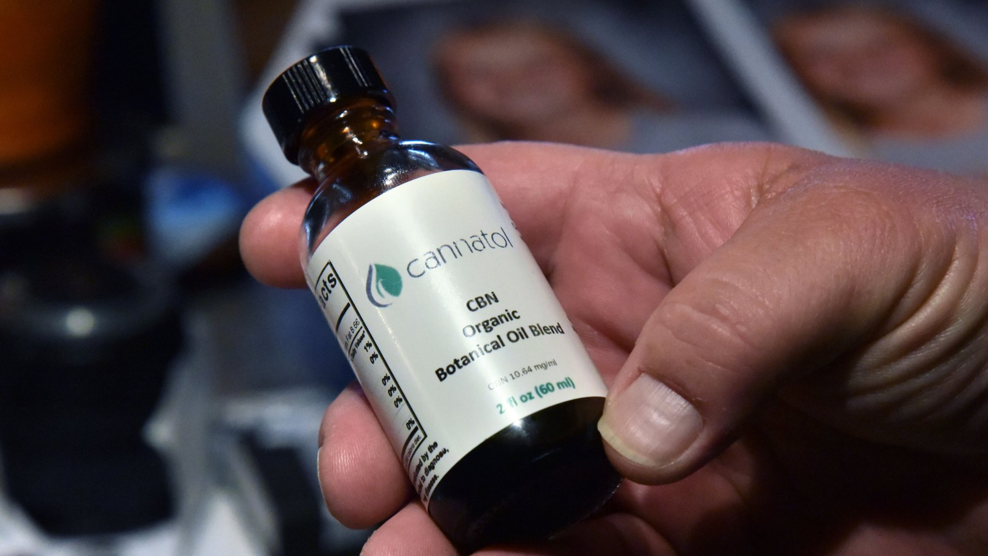 Jim “J-Bo” Wages holds a bottle of cannabis oil for her daughter Sydney at their home in Dallas on Wednesday, February 8, 2017. The family was among the very first to receive permission from Georgia to use low-dose cannabis oil without fear of prosecution. While proponents have sought a broad expansion of Georgia’s limited legalization of medical marijuana and found a likely refuge in the state House, the Georgia Senate this year has quietly moved ahead with a plan that would in effect downsize the nascent program and alienate dozens of families and children currently allowed to possess cannabis oil to help treat debilitating conditions. HYOSUB SHIN / HSHIN@AJC.COM