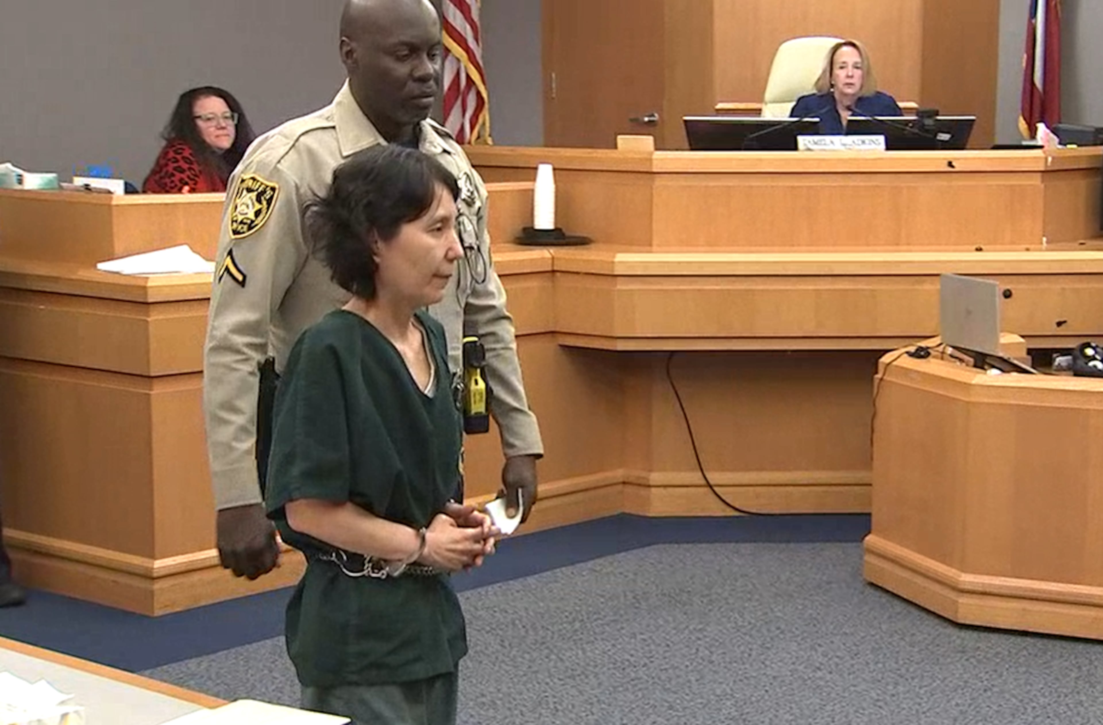 Mihee Lee (left foreground) appeared in court in Gwinnett County for an arraignment hearing on charges related to the death of 33-year-old South Korean woman Seehee Cho. Jan. 17, 2023. (Credit: Channel 2 Action News)