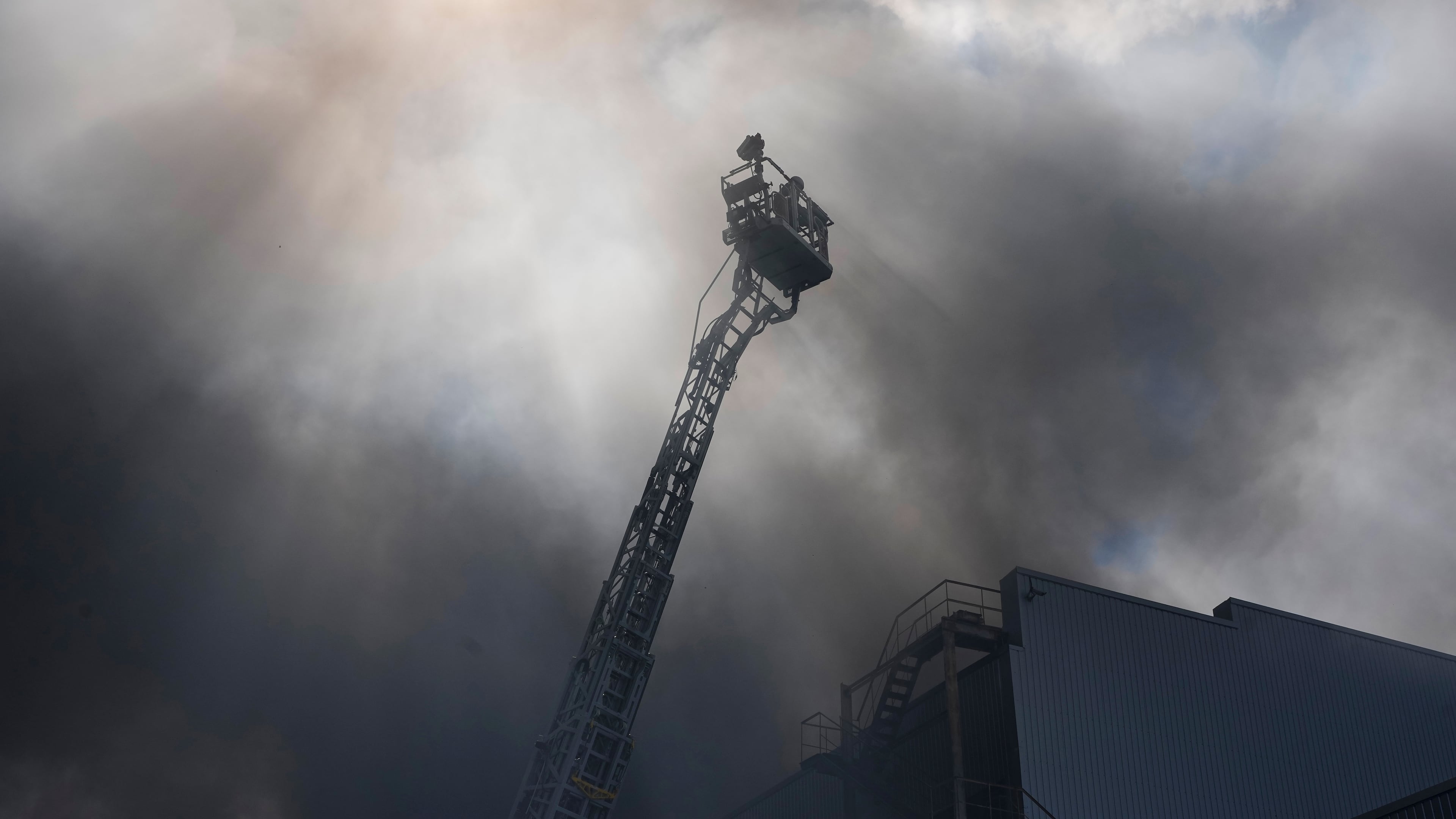 Firefighters put out a fire at warehouse stores after a Russian air attack in Kyiv, Ukraine, Wednesday, Sept. 2, 2026. (AP Photo/Efrem Lukatsky)