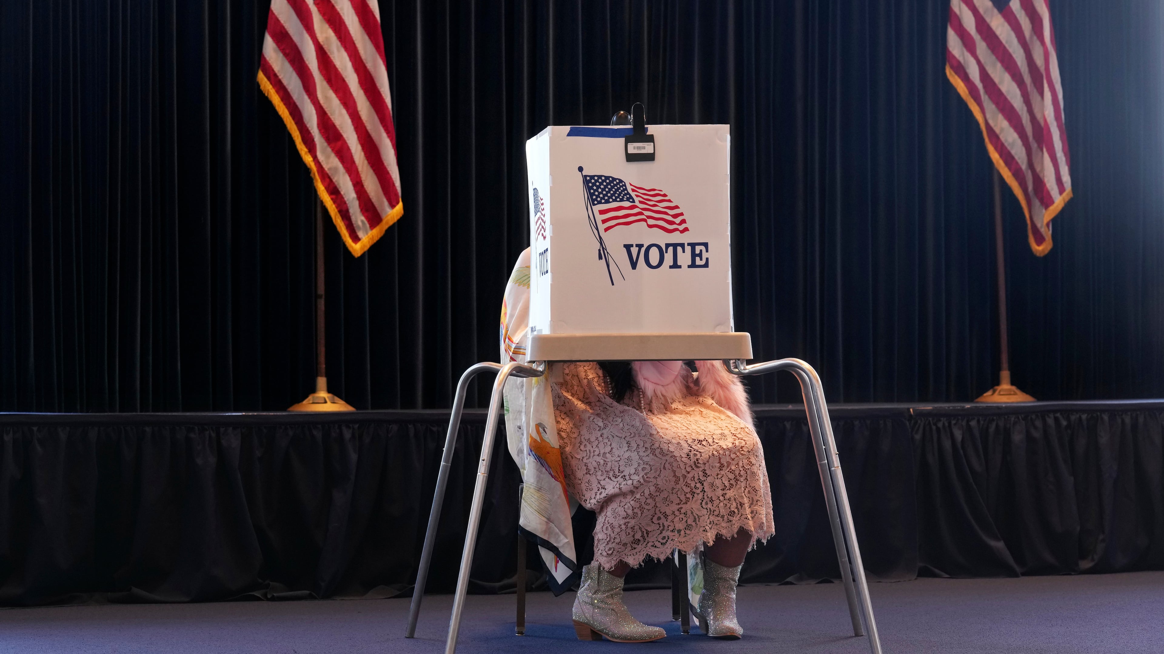 FILE - A voter prepares a ballot at a polling place at the Ronald Reagan Presidential Library on Election Day, Tuesday, Nov. 5, 2024, in Simi Valley, Calif. (AP Photo/Chris Pizzello, File)