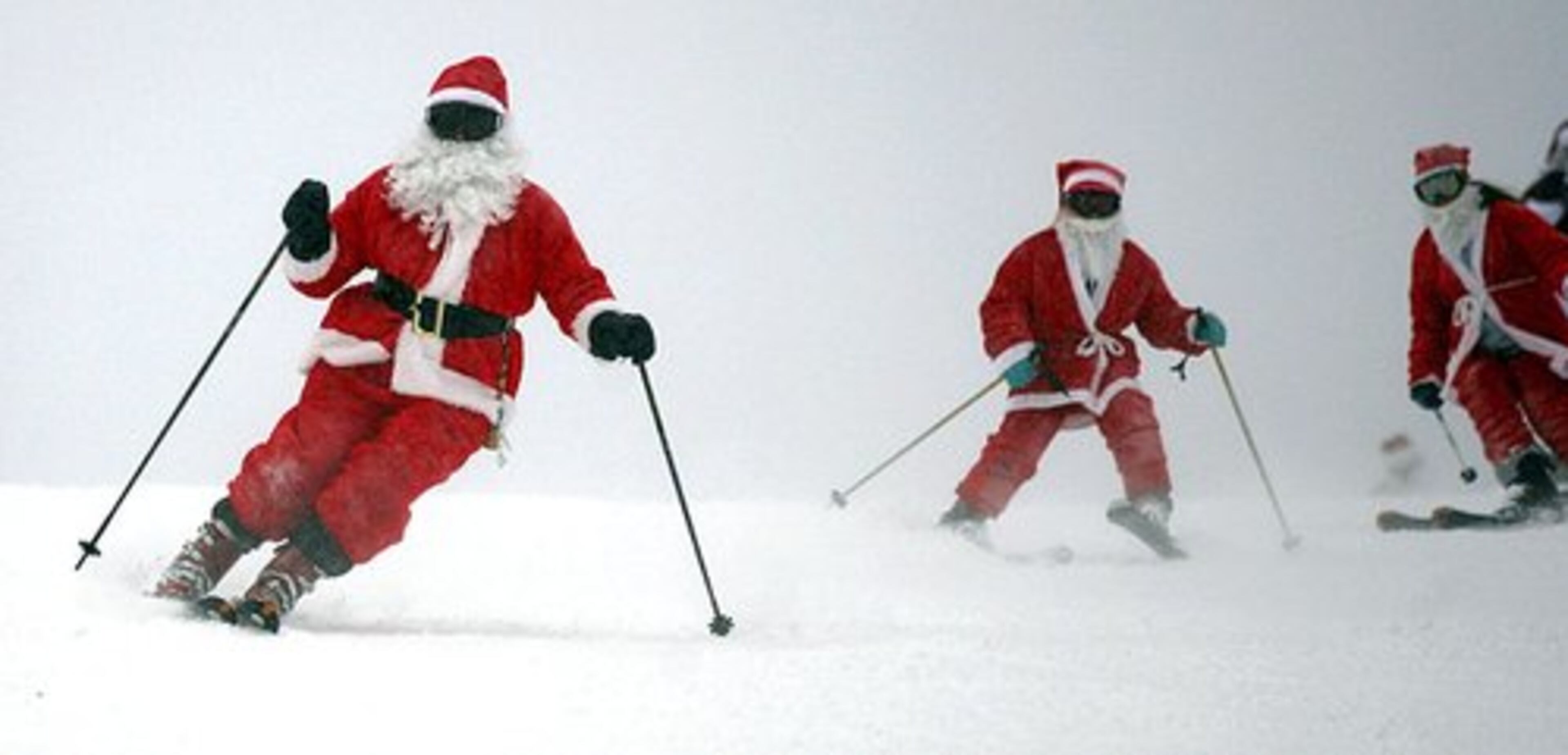Anyone who lives in the frigid North Pole should know how to ski. Here, Santas take advantage of the annual Santa Skis for Free Day at The Canyons in Park City, Utah.