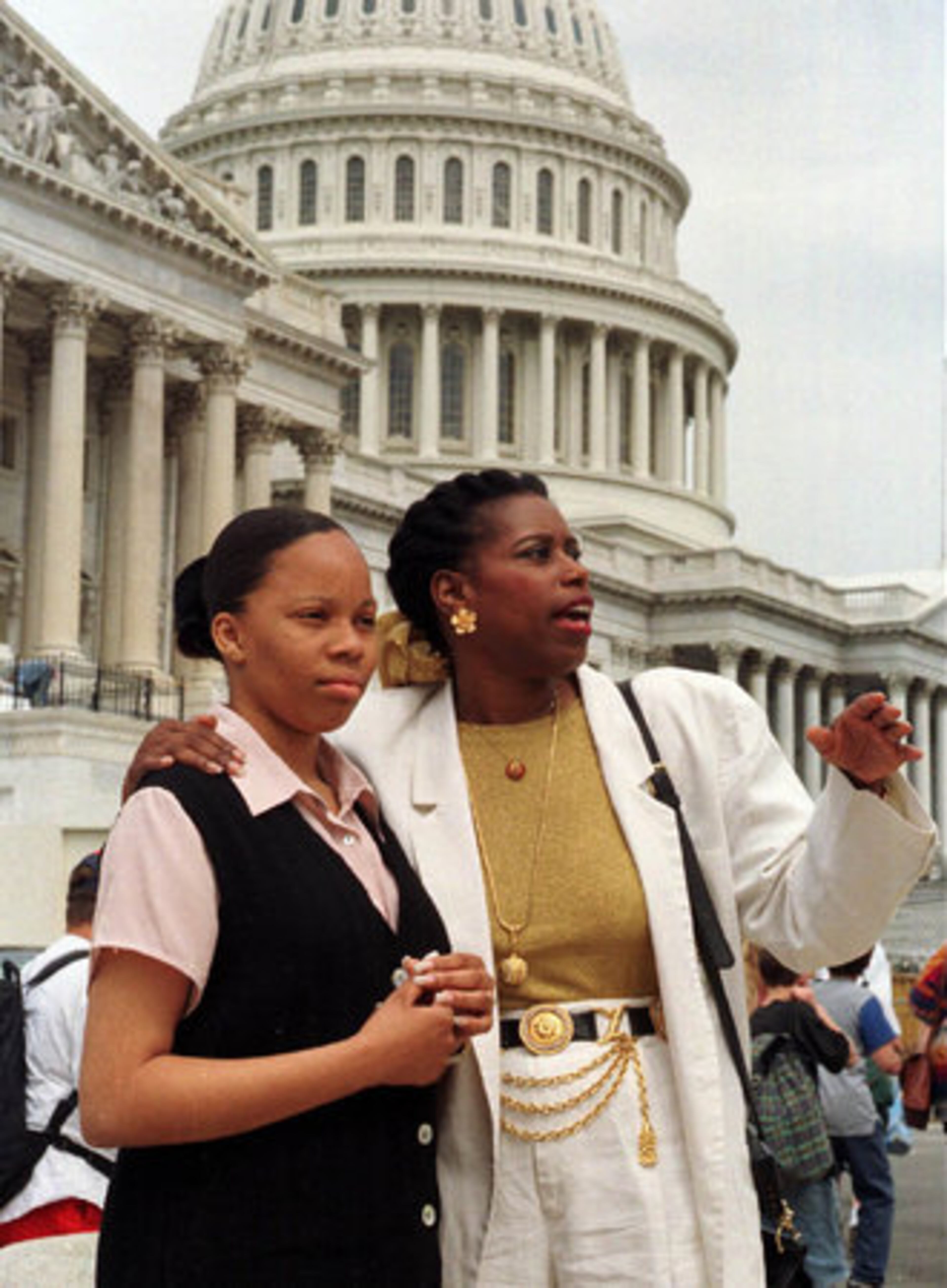 McKinney points out Capitol Hill landmarks to Shanterri Grier, then 14, on April 26, 1996. McKinney has been a mentor to Shanterri and brought her to Washington for Take our Daughters to Work Day.