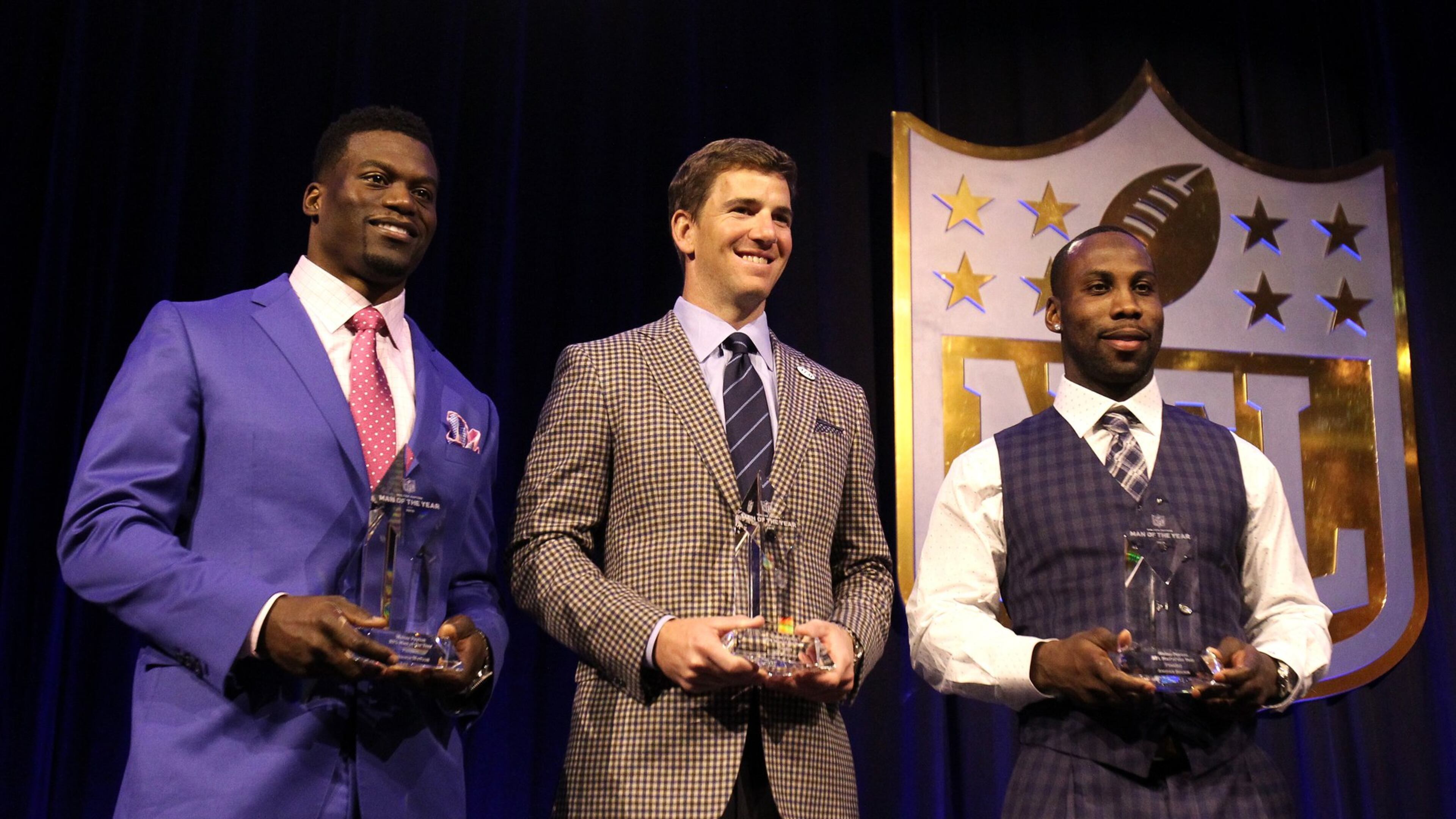 Pahokee’s Anquan Boldin, right, appears with fellow 2015 Walter Payton NFL Man of the Year finalists Benjamin Watson of the Saints and Eli Manning of the Giants. (Photo by Mike Lawrie/Getty Images)