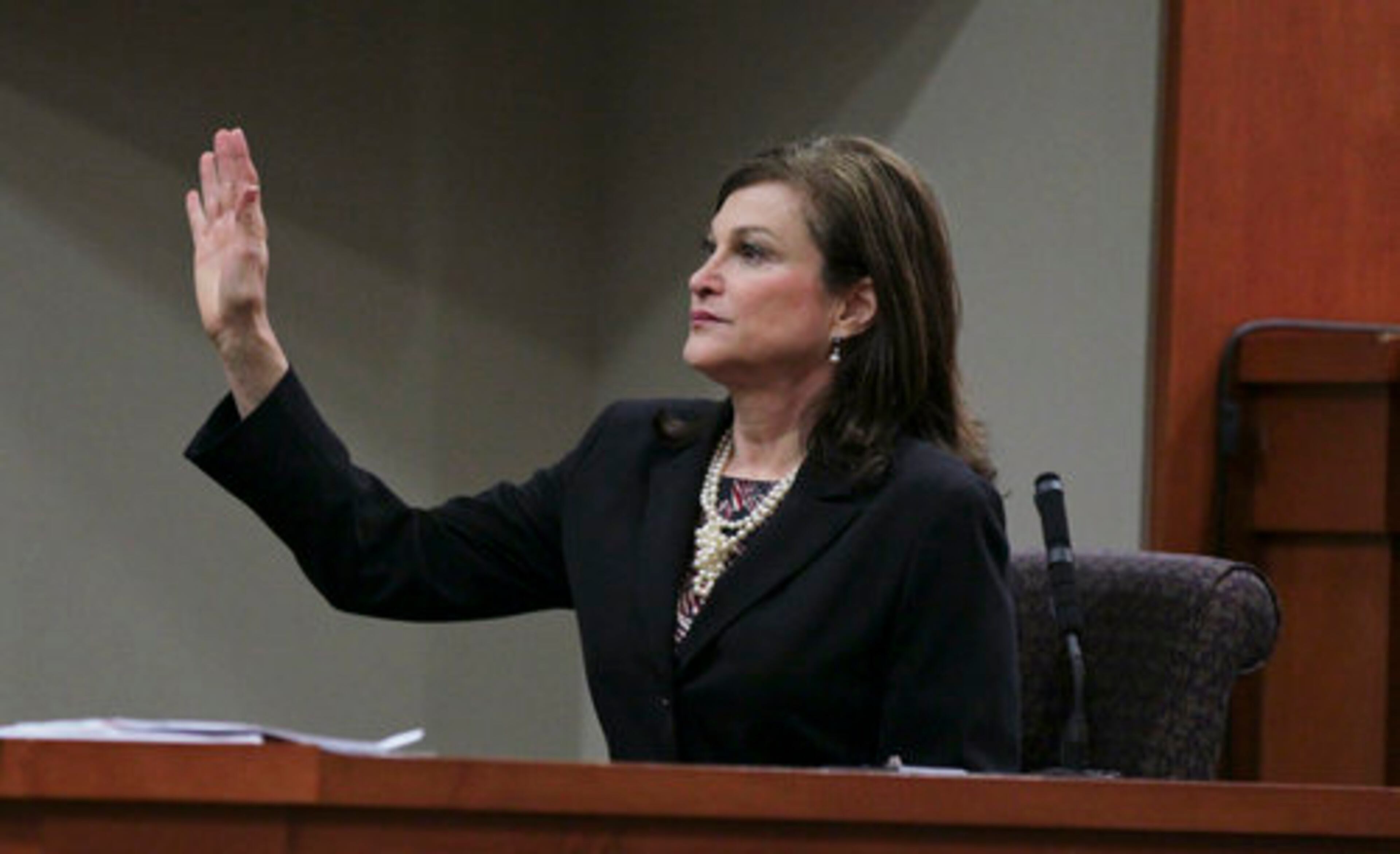 Jane Newman, executive director of Dunwoody Prep, who described the location where Rusty Sneiderman was shot. She testifies there are 48 security cameras at the school, one of which caught a silver minivan leaving the scene.