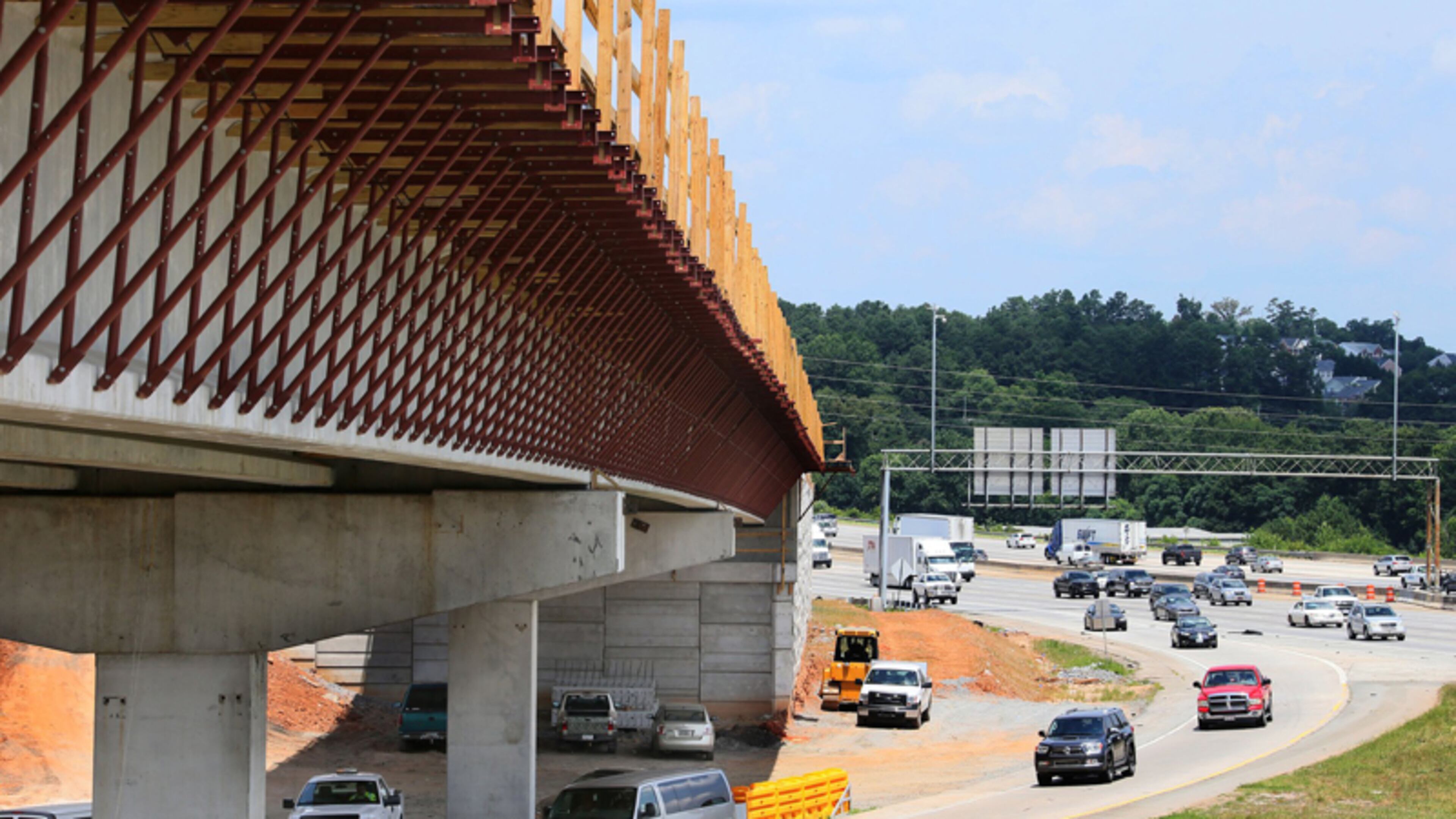 A bridge under construction will carry the Northwest Corridor express toll lanes over the Canton Road Connector. The Georgia Department of Transportation plans to close two southbound lanes on I-575 overnight in the Woodstock area as part of the project. BOB ANDRES / BANDRES@AJC.COM
