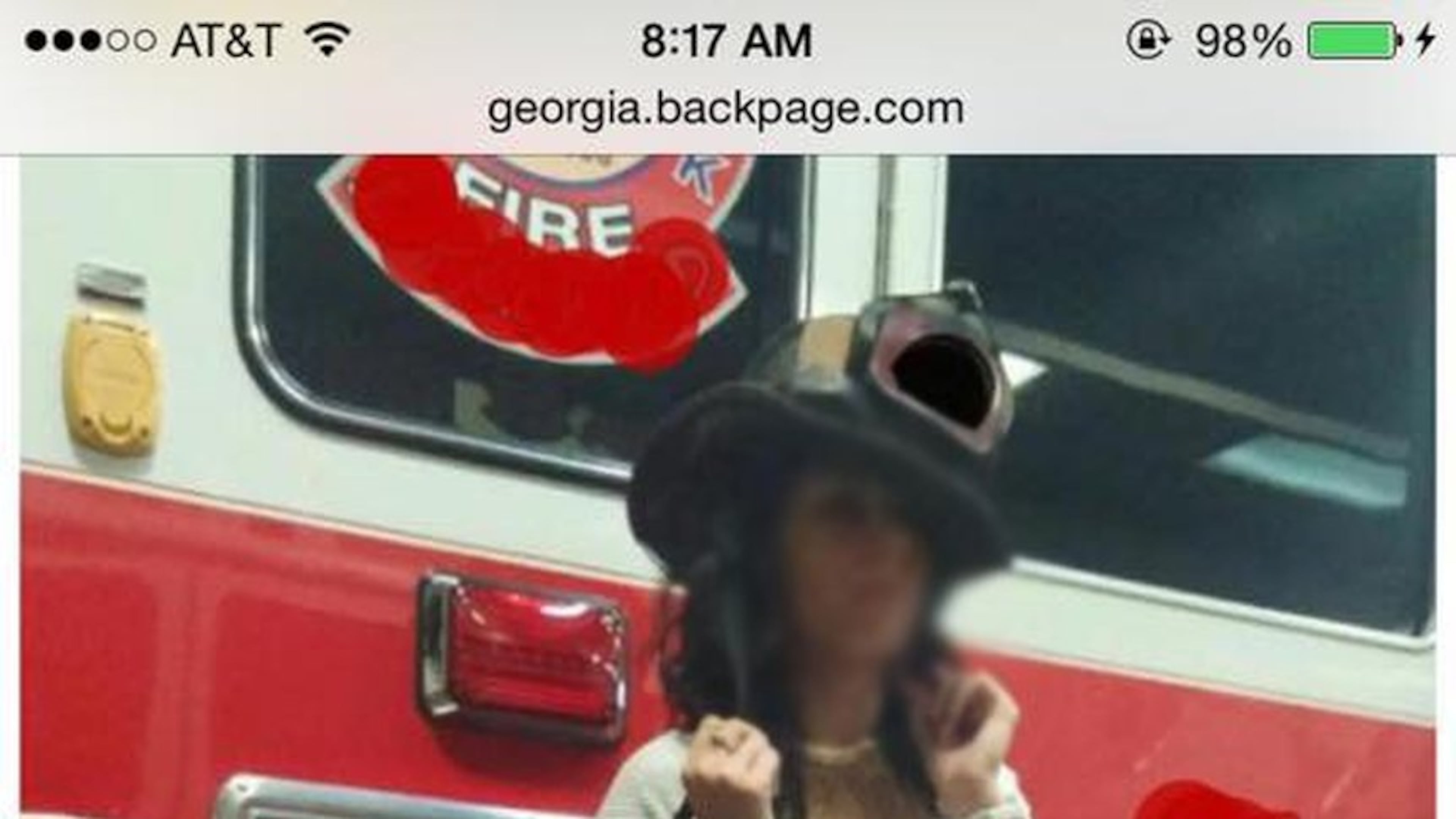 Photo illustration The AJC obscured the woman’s face in this photo to protect her identity. When we received the photo, the emblems and identifiers of the Atlanta Fire Department already had been obscured.