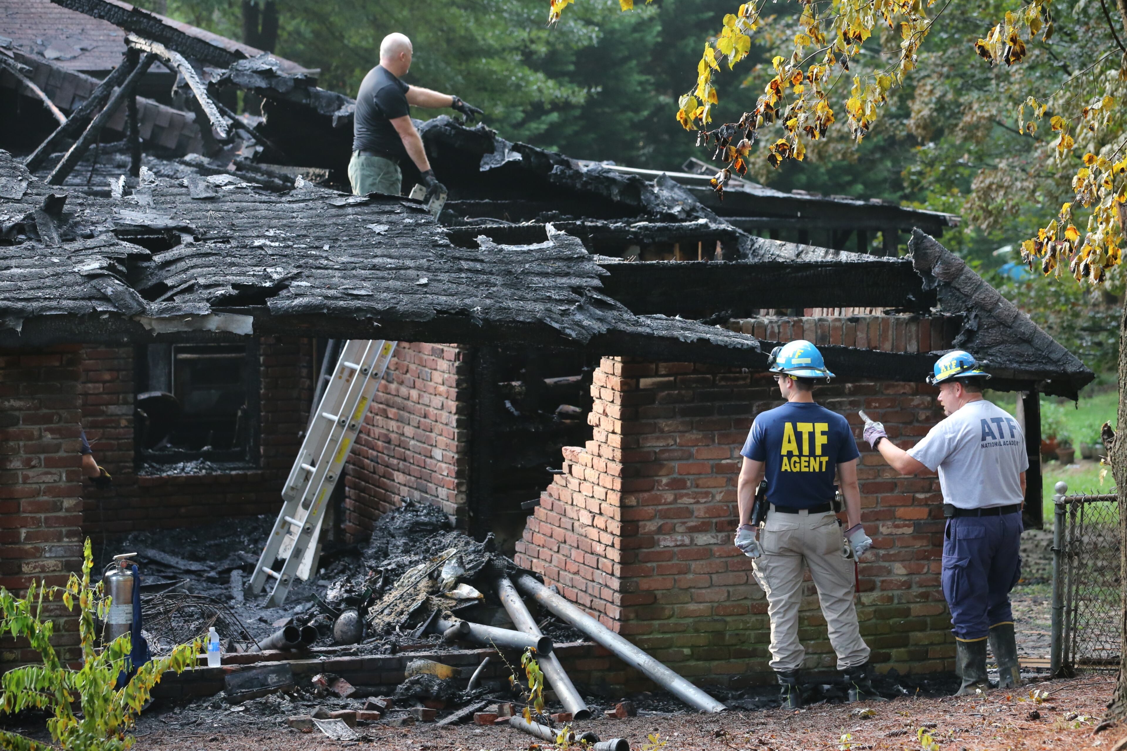 The fire was reported shortly after 2 a.m. in a split-level home on Revere Road, in a neighborhood that sits between I-285 and Fairburn Road. JOHN SPINK / JSPINK@AJC.COM