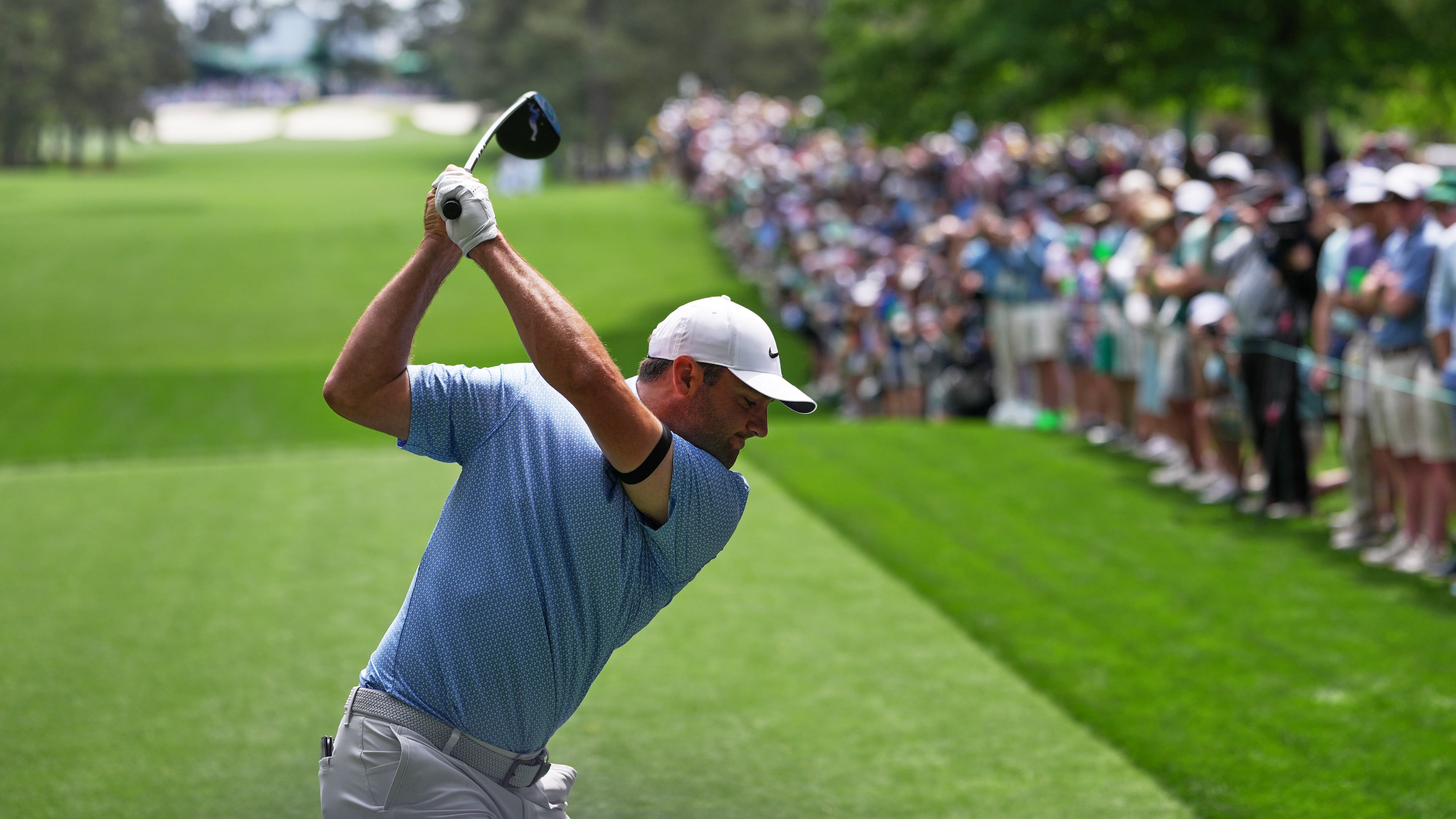 Scottie Scheffler hits his tee shot on the seventh hole during a practice round ahead of the Masters golf tournament at the Augusta National Golf Club, Tuesday, April 7, 2026, in Augusta. (Matt Slocum/AP)