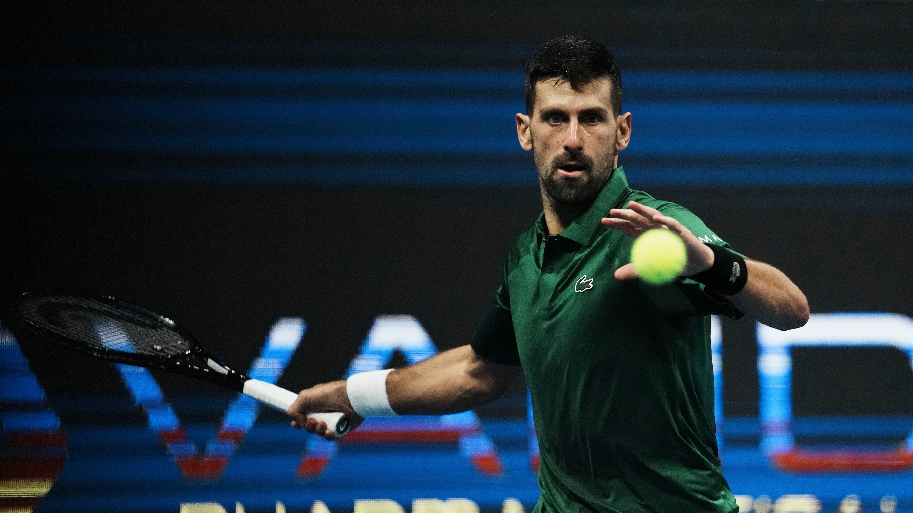 FILE - Novak Djokovic, of Serbia, plays a shot against Yannick Hanfmann, of Germany, during the ATP250 tournament semifinal tennis match in Athens, Greece, Nov. 7, 2025. (AP Photo/Thanassis Stavrakis, File)