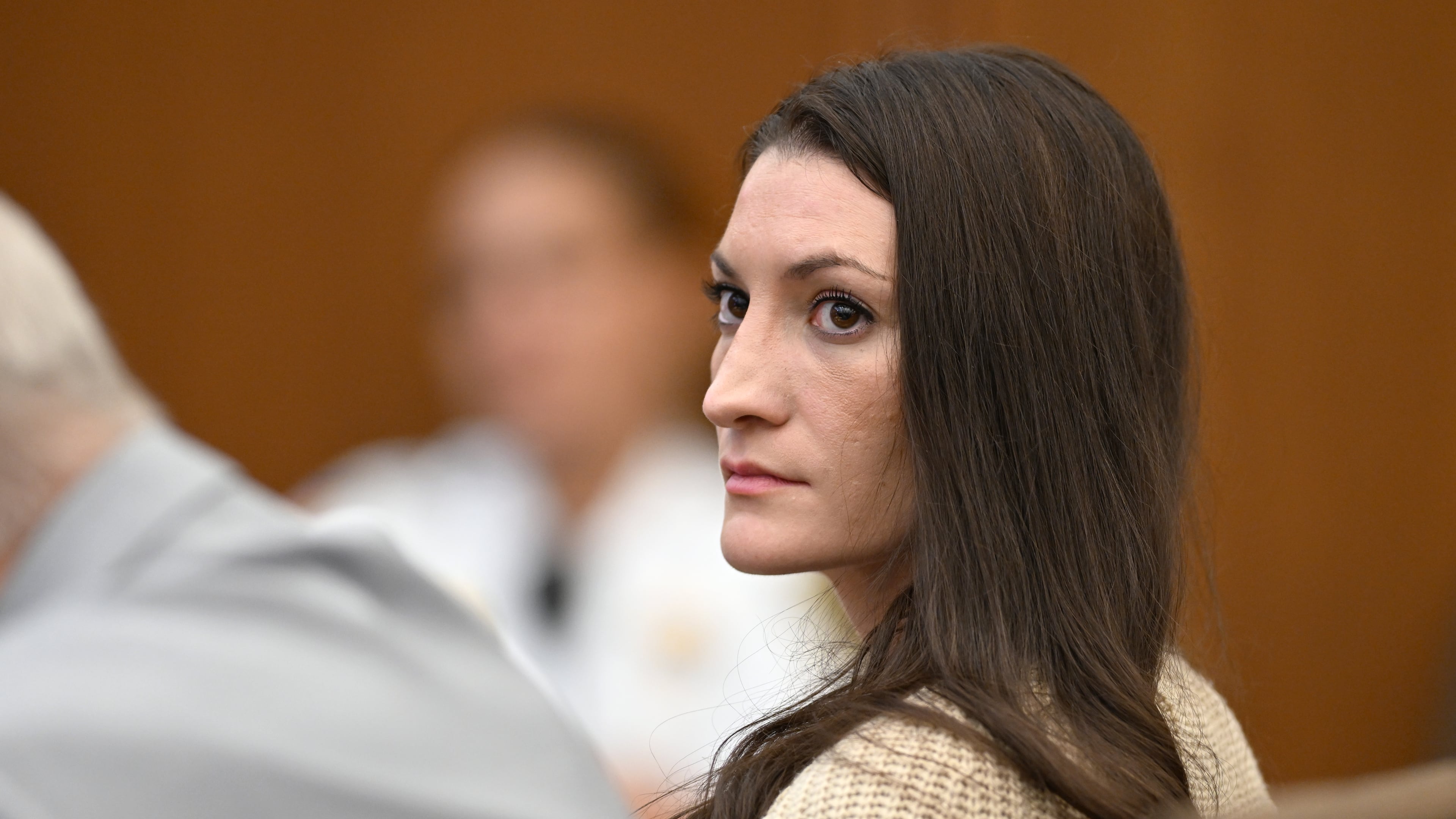Lindsay Clancy, looks toward reporters in the courtroom during proceedings in her murder trial, Thursday, Aug. 20, 2026, in Plymouth, Mass. (AP Photo/Josh Reynolds, Pool)