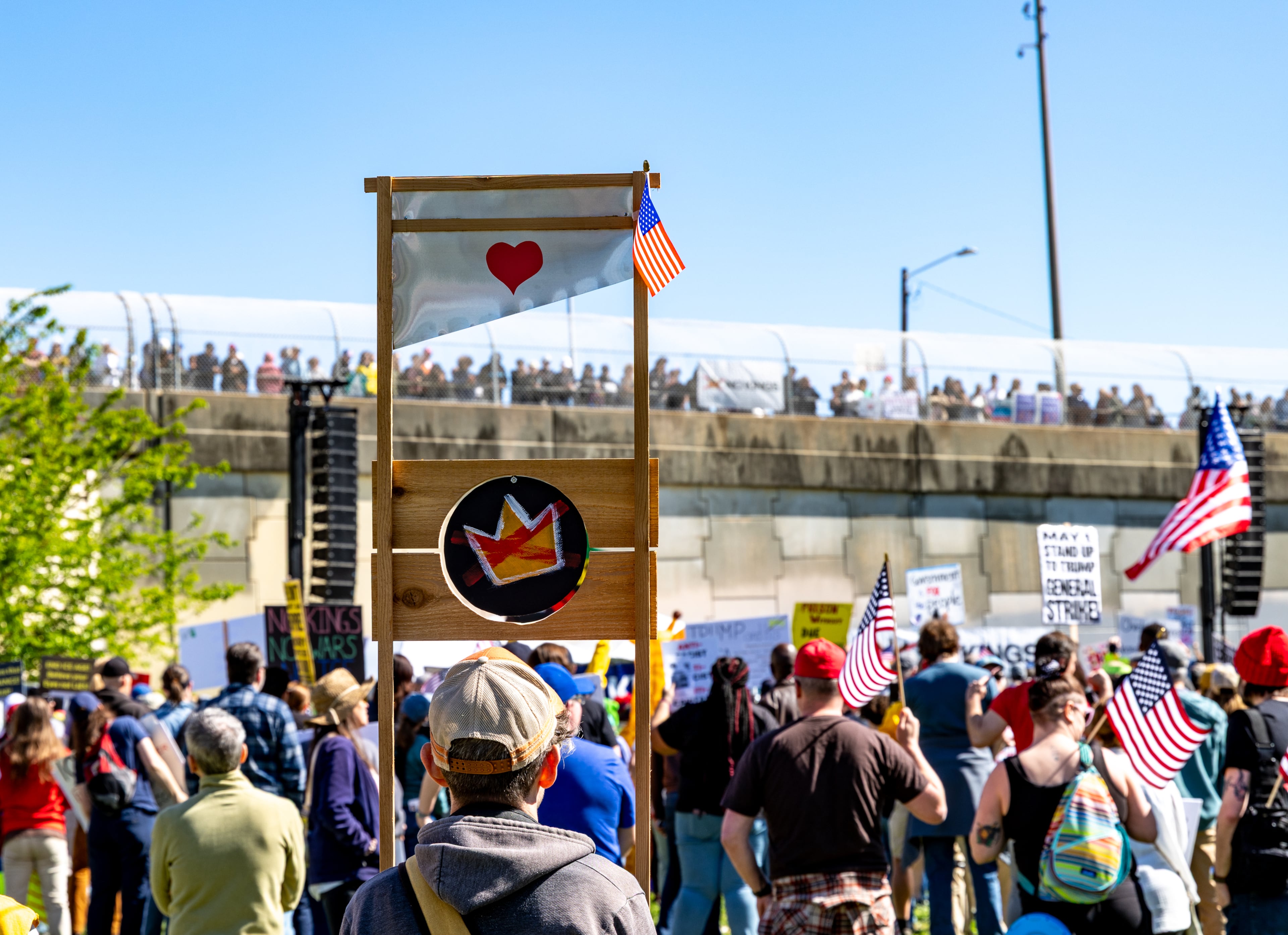 Demonstrators gather as they begin to march toward the state Capitol during the No Kings protest on Saturday, March 28, 2026, in Atlanta. (Jenni Girtman for the AJC)