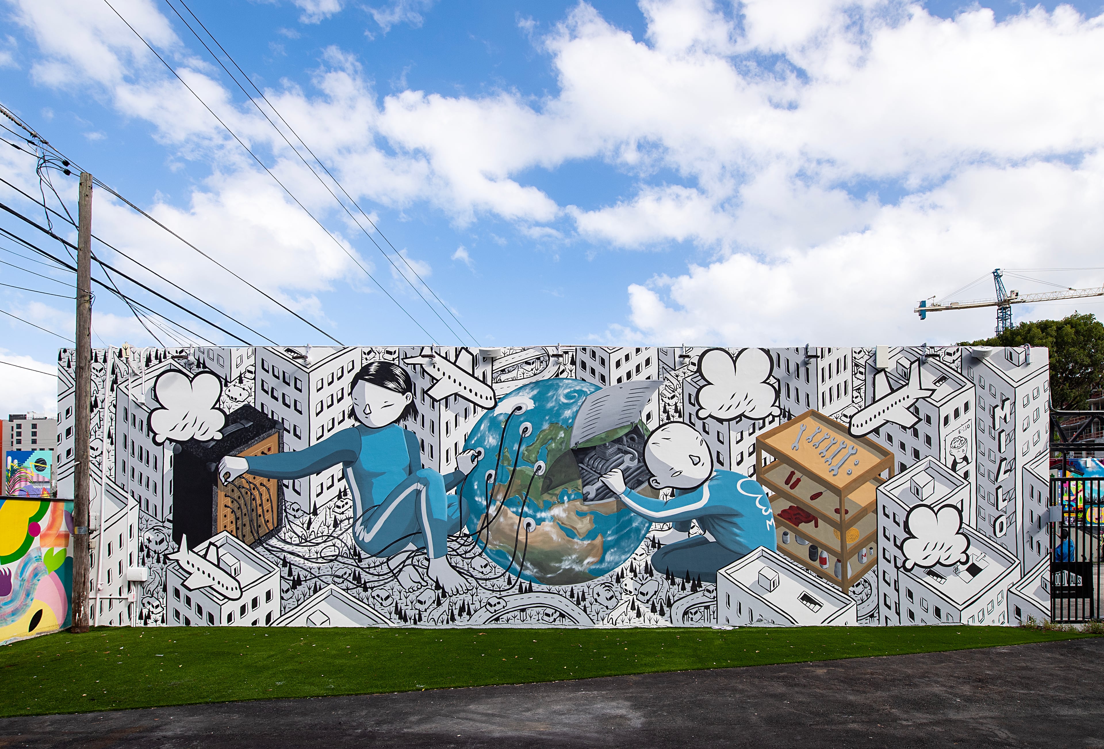 Works by more than 100 international artists, such as this mural by Millo, decorate Wynwood Walls in Miami. (Courtesy of Wynwood Walls)