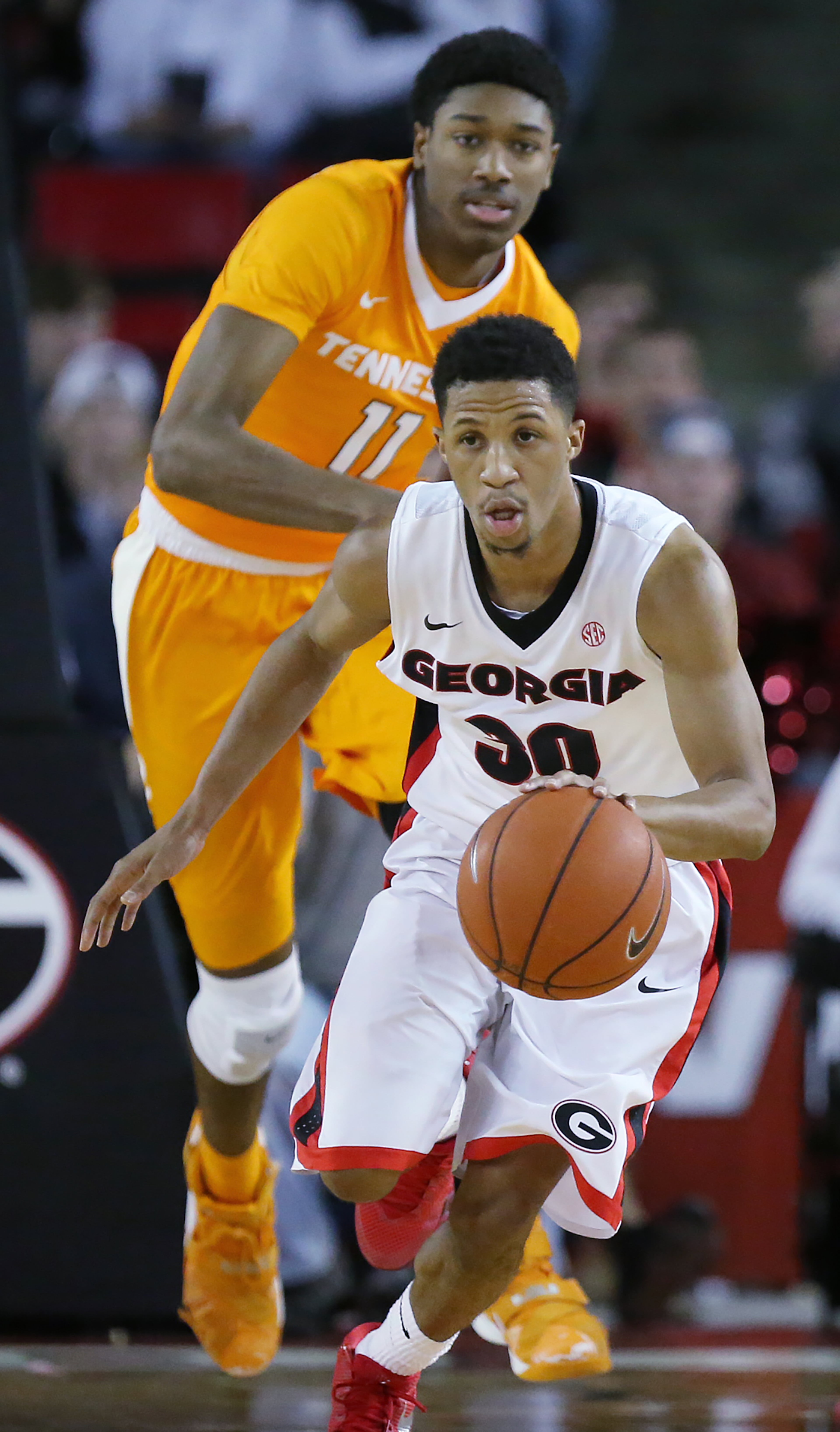 Georgia guard J.J. Frazier gets a steal from Tennessee forward Kyle Alexander in a basketball game on Wednesday, Jan. 13, 2016, in Athens. Georgia beat Tennessee 81-72. Curtis Compton / ccompton@ajc.com