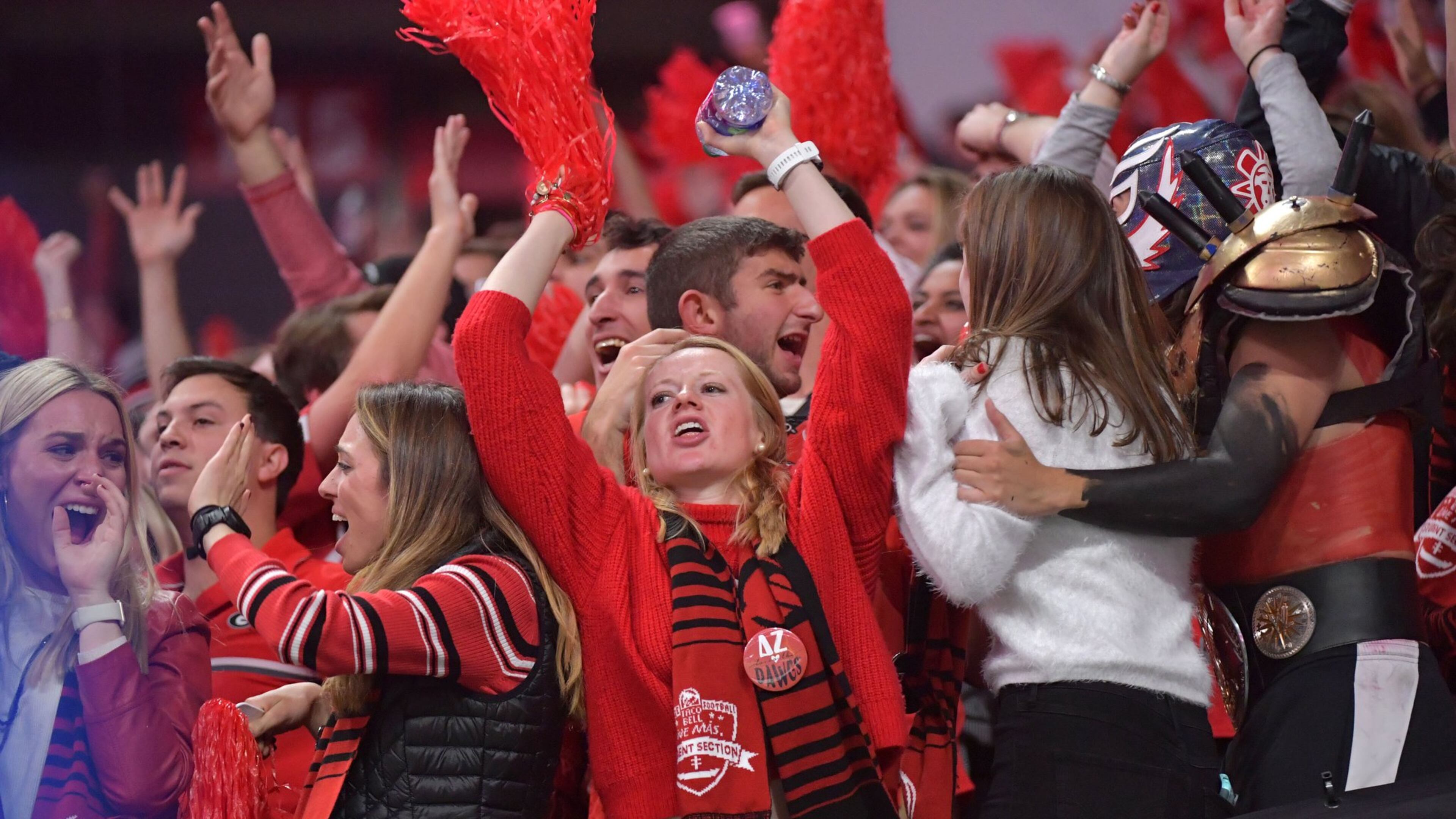 Georgia fans react in the second half during College Football Playoff National Championship at Mercedes-Benz Stadium. The Georgia Bulldogs didn’t win, but playing on the national sports stage can provide other benefits to universities. HYOSUB SHIN / HSHIN@AJC.COM
