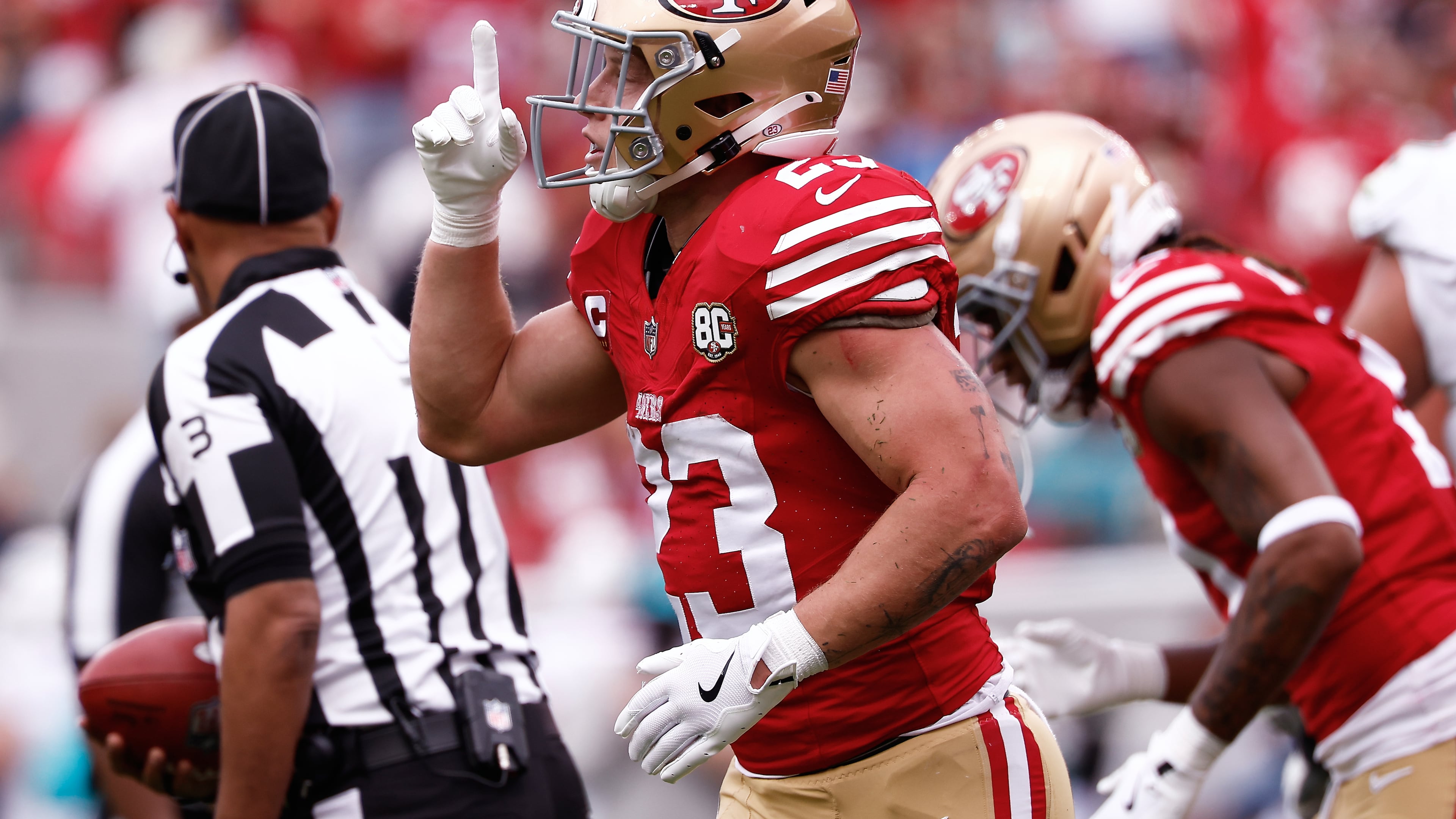 San Francisco 49ers running back Christian McCaffrey celebrates after scoring against the Miami Dolphins during the first half of an NFL football game in Santa Clara, Calif., Sunday, Sept. 20, 2026. (AP Photo/Kelley L. Cox)